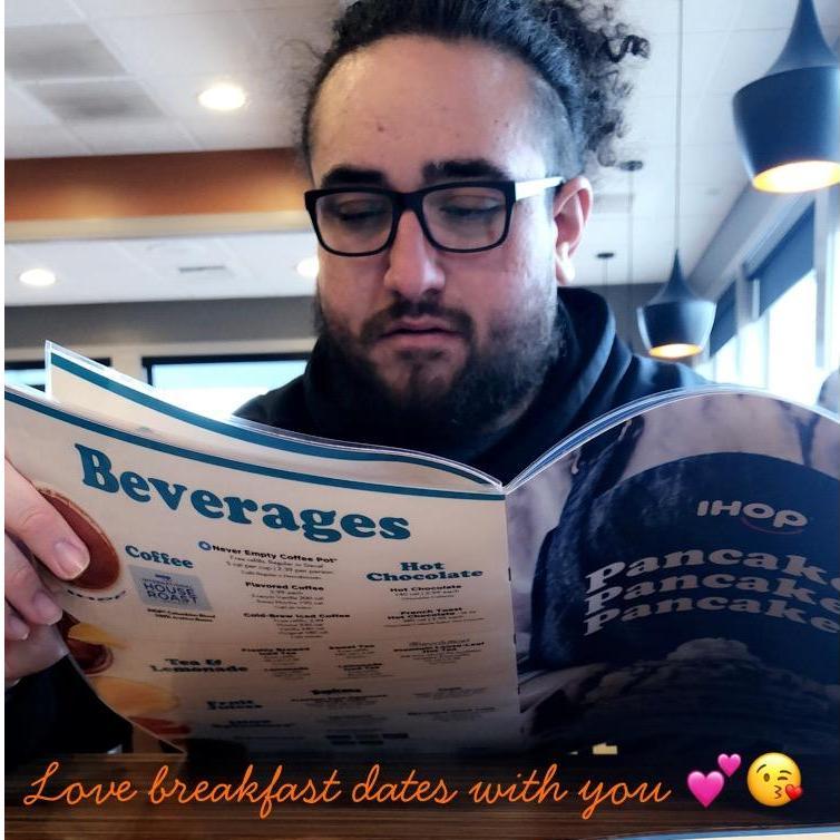 I snapped this of him at IHOP 🥞right before I mentioned him not asking me to be his girlfriend at our dinner date.