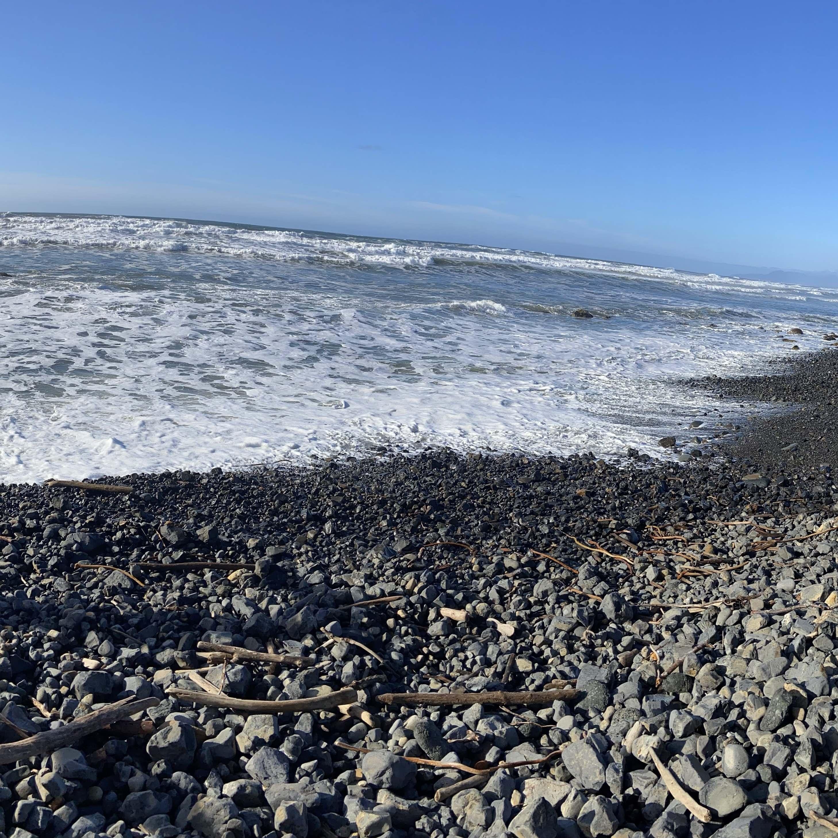 {Cape Meares, Tillamook Oregon} We walked the rocky beach and listened to the waves crash the rocks back and forth. When we stopped to take it all in, Eric Proposed in a secluded spot!
