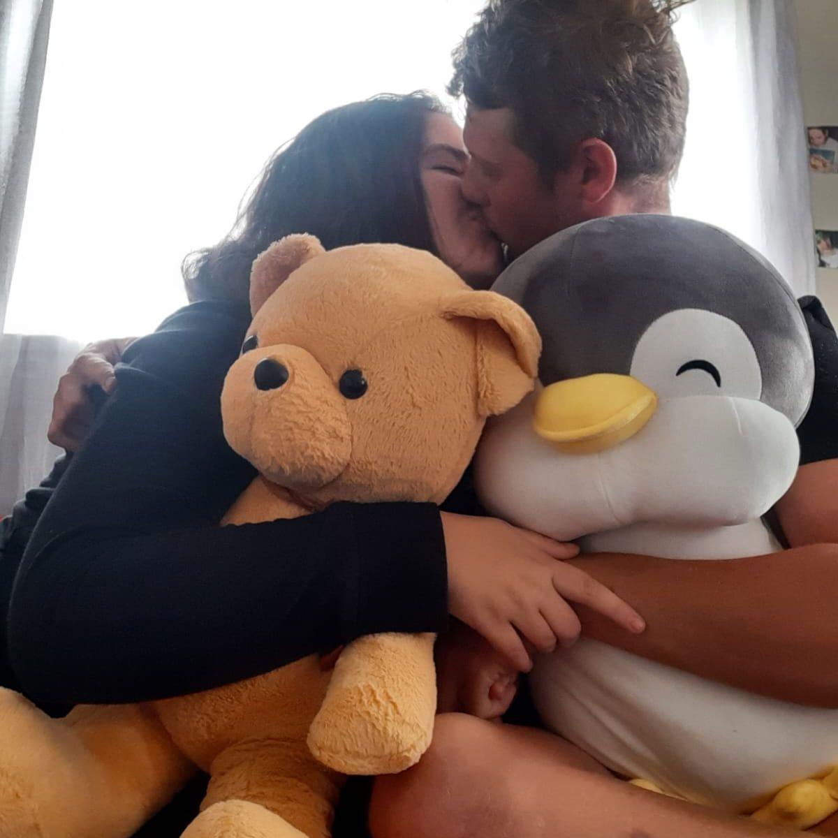 One of the first and the brides' favorite picture of their stuffed animals they bought for each other, to keep them company when they lived far apart!