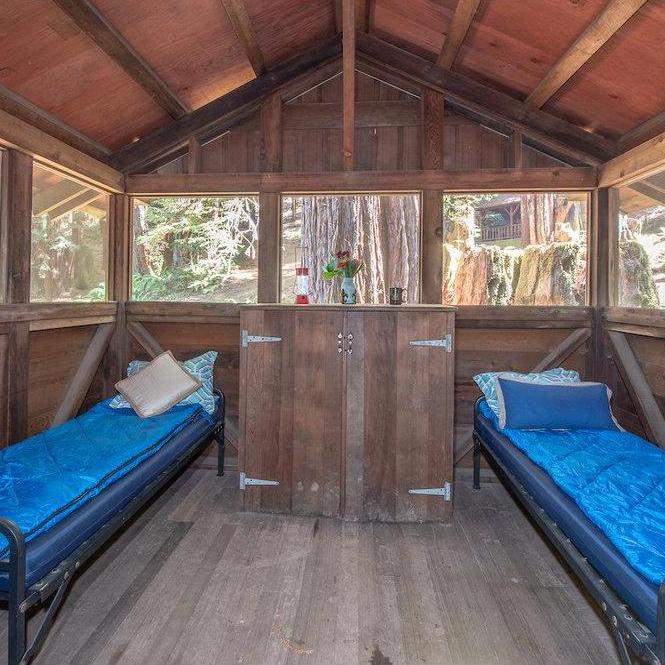 Inside one of the open-air cabins. Don't forget your sleeping bag and pillows!