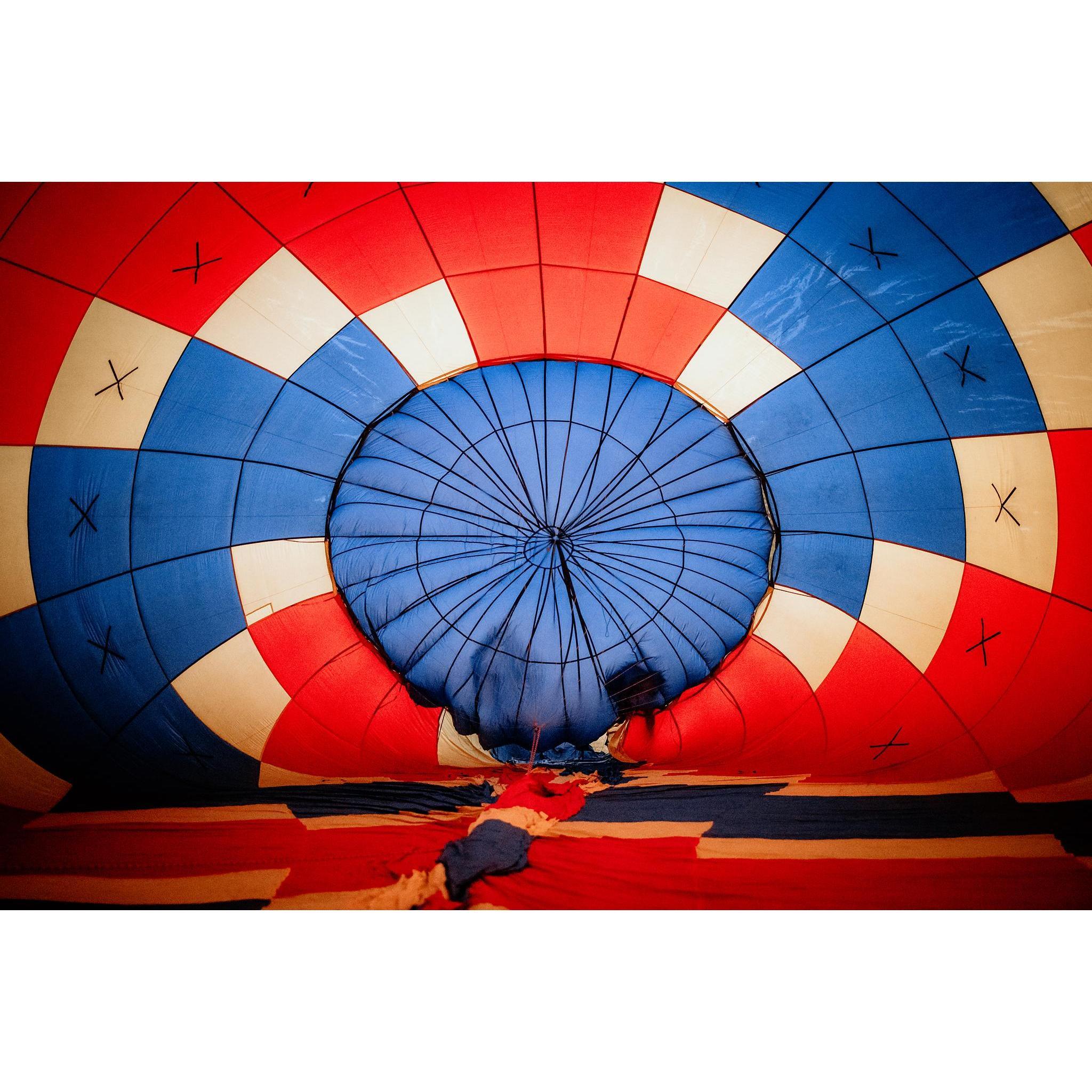 Inside the envelop of the hot air balloon.