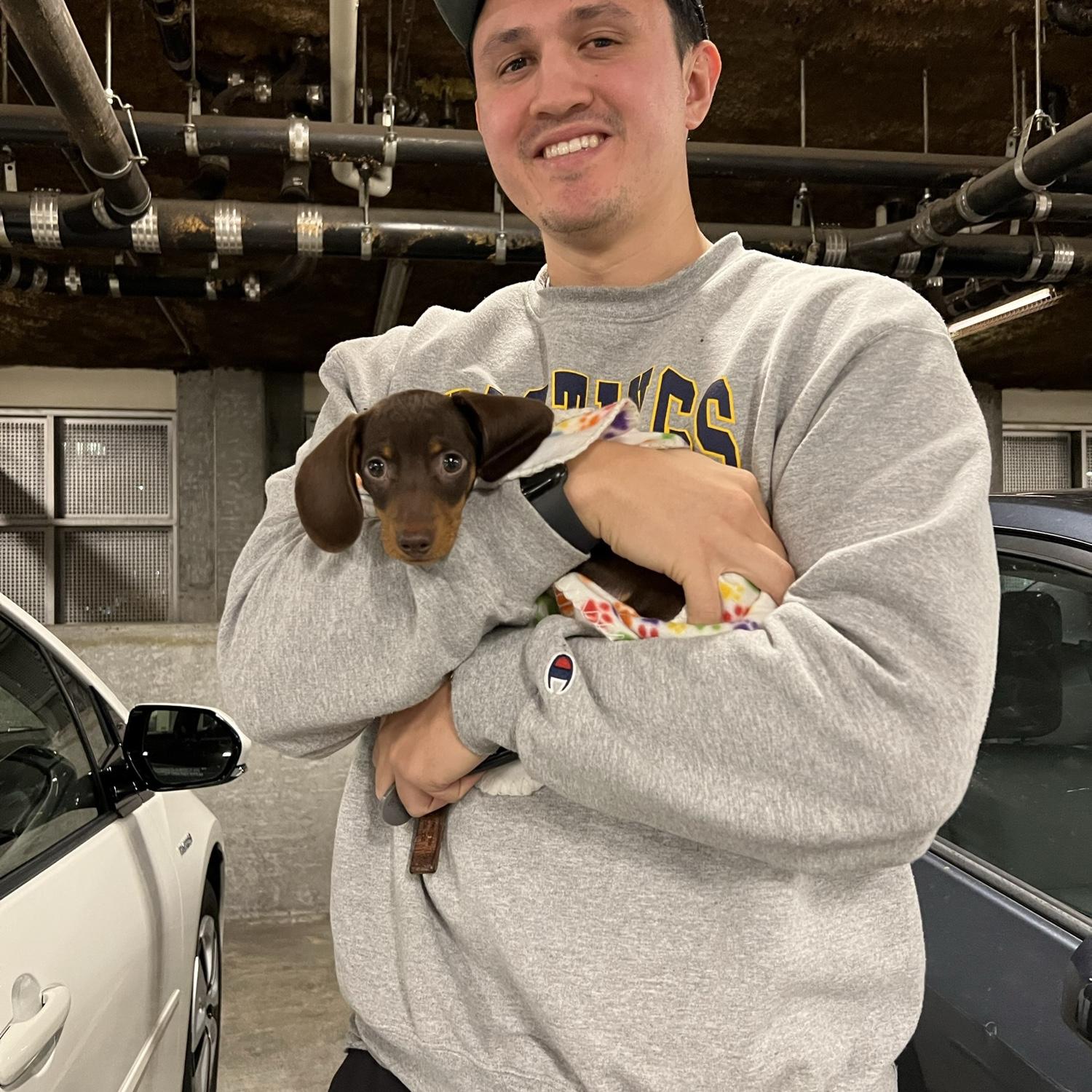 October 2022: Kellie and Alex become parents! Winston becomes their newest obsession (and the cause of many future gray hairs).