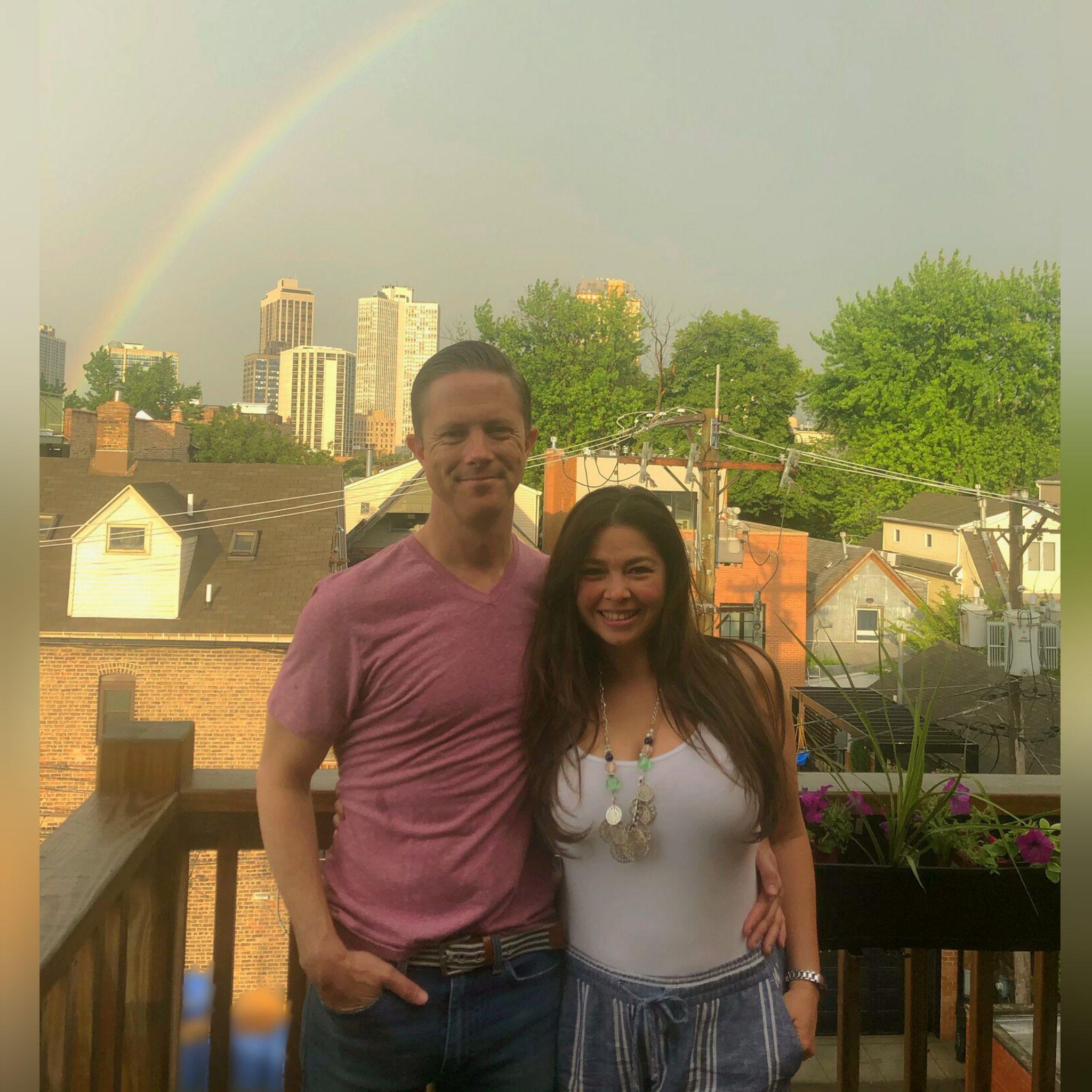 On our back balcony on Halsted "She's like a rainbow" - Our first place in the city together (the rooftop was the best!) - summer 2019
