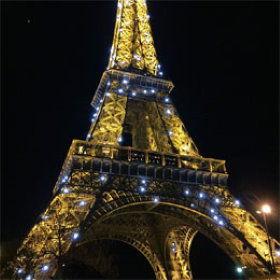 Rome the Champ de Mars for up close views of the Eiffel Tower. Stick around until after dark to see it sparkle!