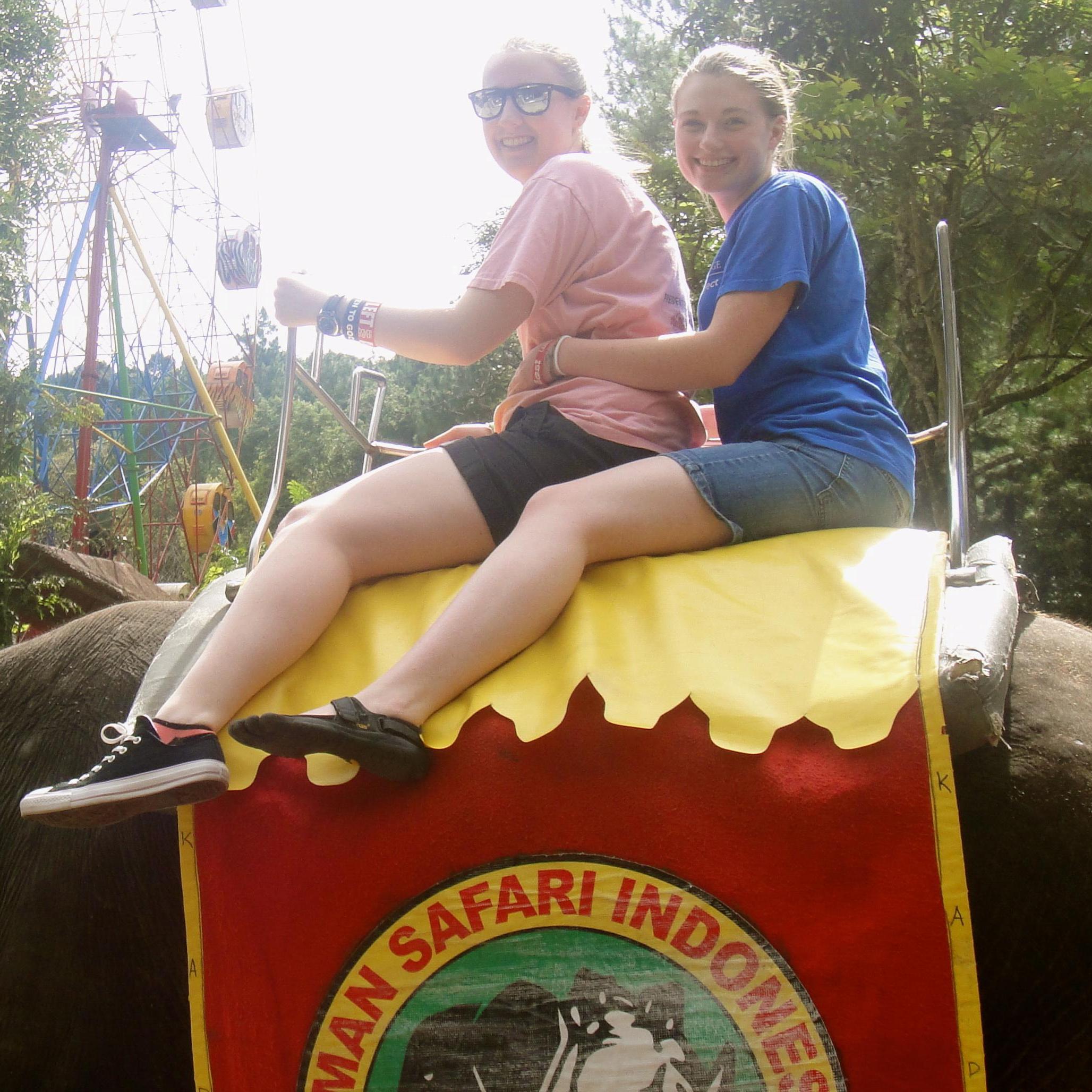 Here we are riding an elephant while visiting Sarah's Dad in Indonesia.