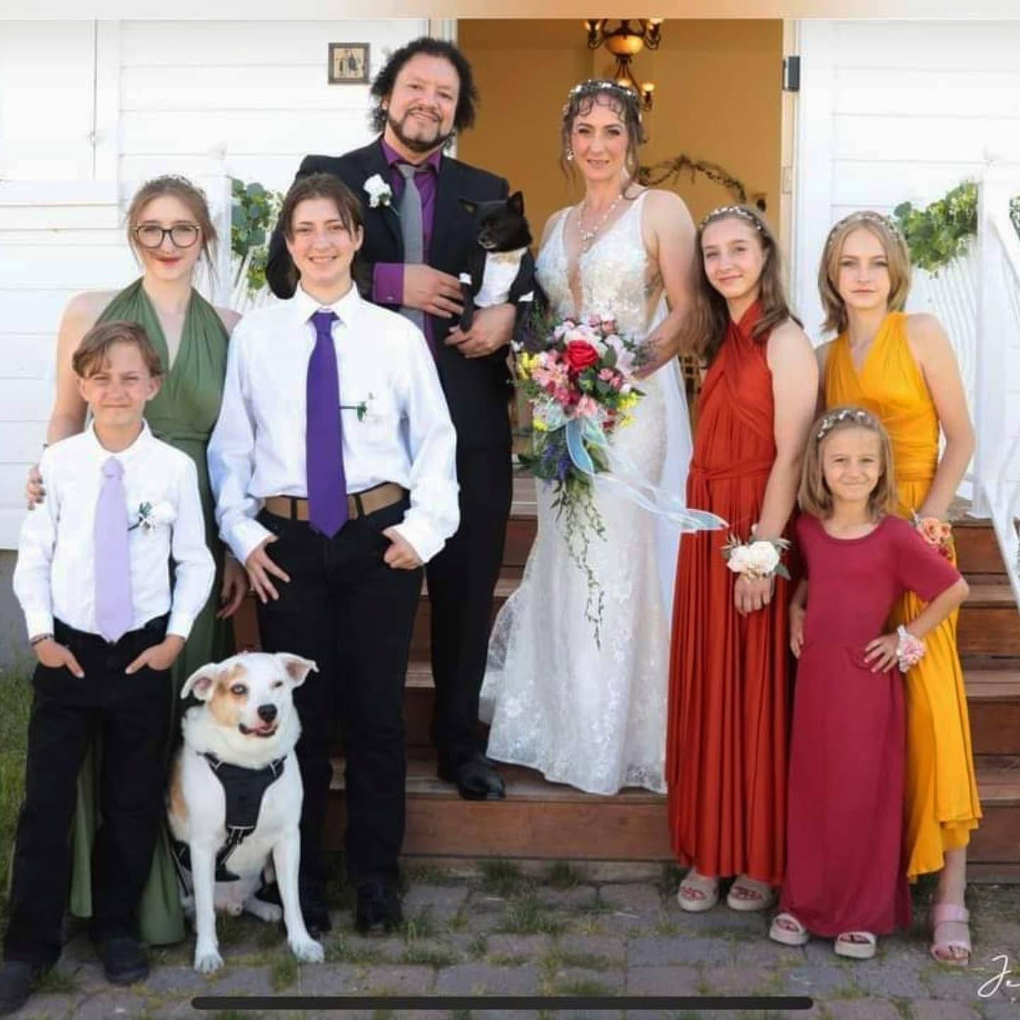 Willow, her siblings (Teddy, Robin, Eowyn, Mahonri & Aurelia), the dogs (Arthur & Yoda), her mother and stepfather, at Roman & Kandle's wedding last summer.