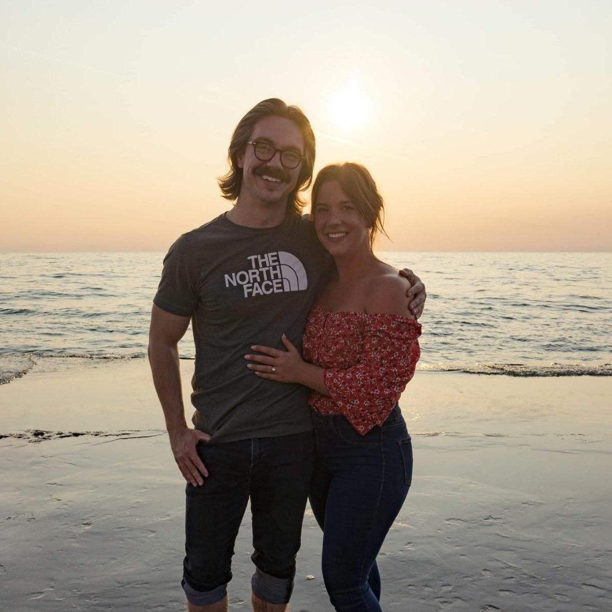Bobby proposed on the pier in Grand Haven, Michigan.