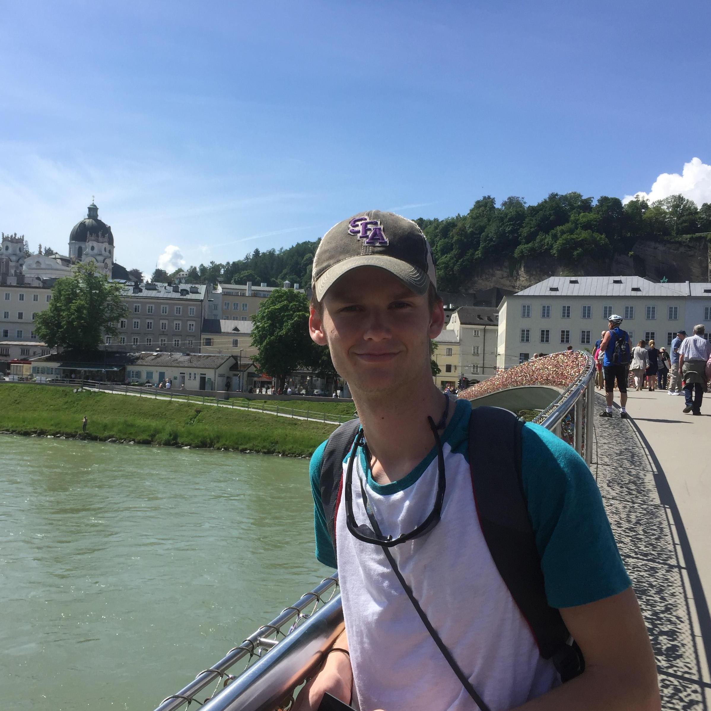 May 23, 2018: Connor standing on the Salzburg bridge. (What a HANDSOME man!!)