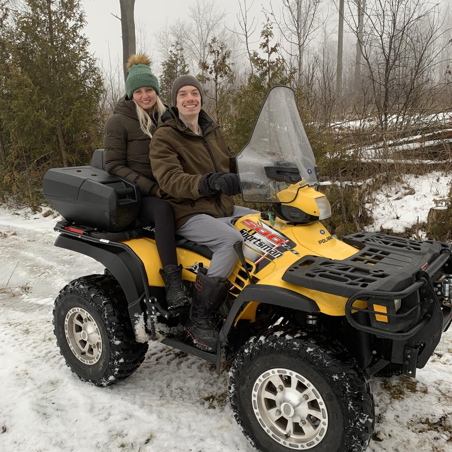 On the new four wheeler John got!! Touring the Cleary property