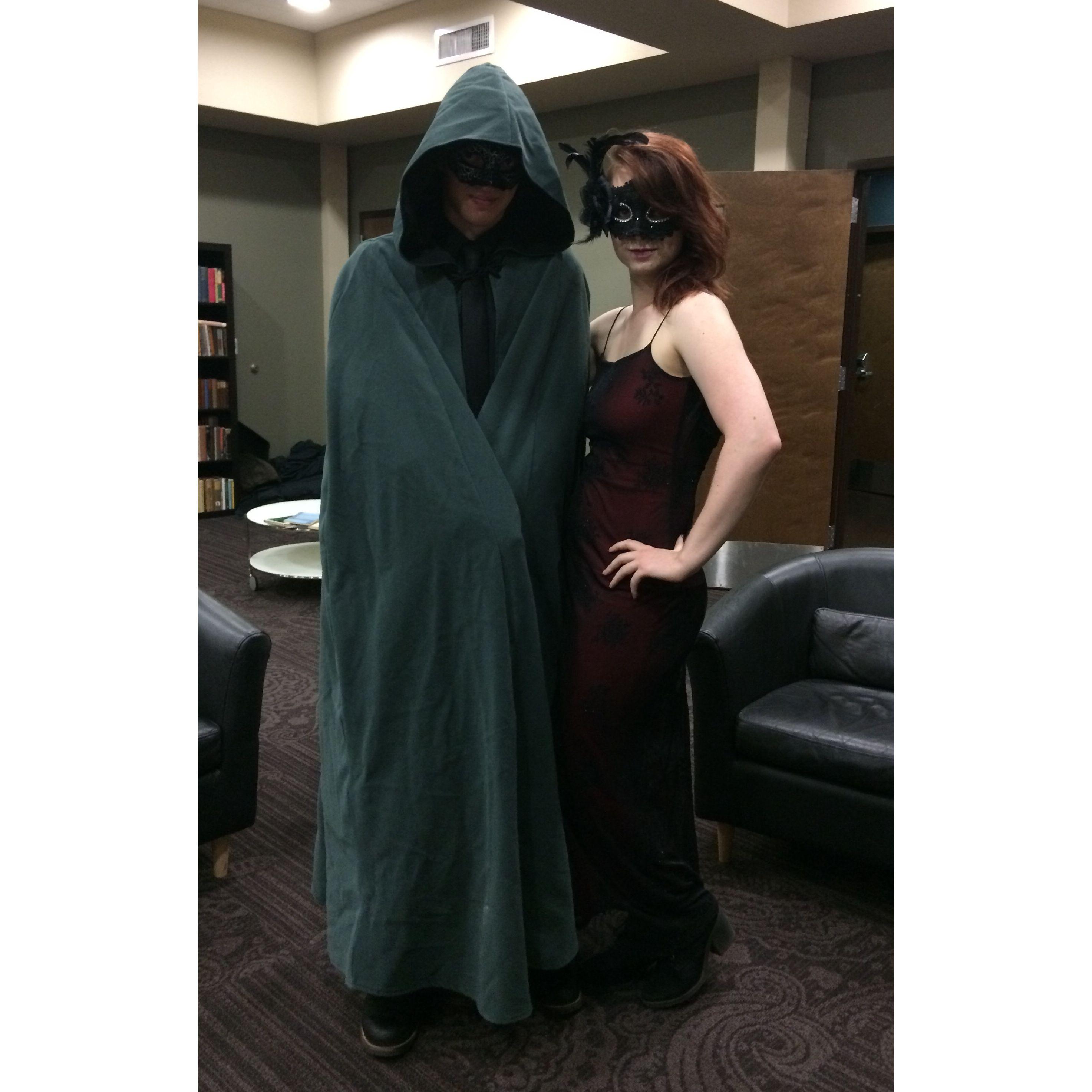 Alex and Eliza dressed appropriately for the Masquerade themed freshman-senior welcome party, early September 2018 (not dating yet)
(Also Alex is wearing a cloak that belongs to Eliza)