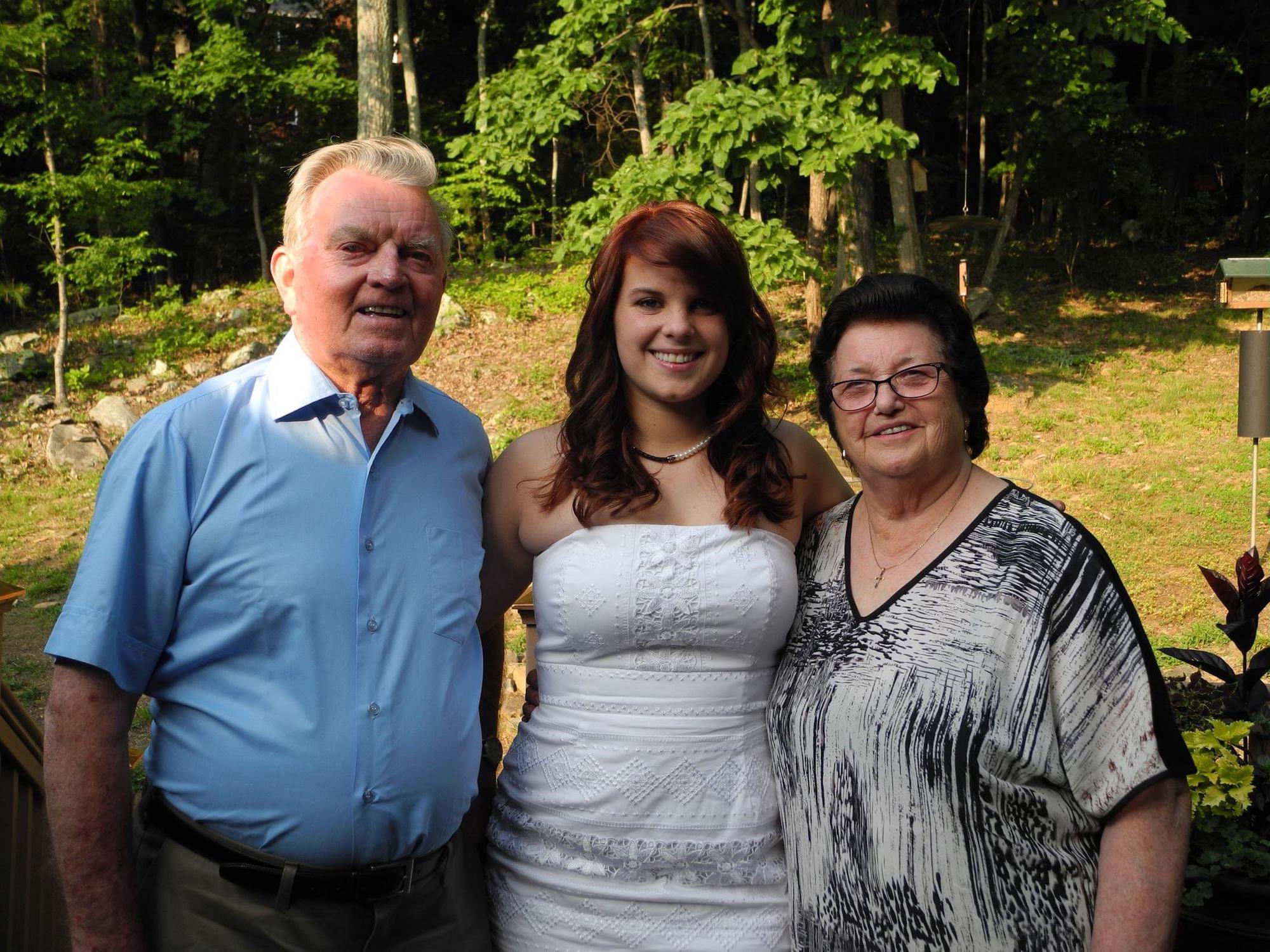 Nikki with Opi and Omi at high school graduation, 2012.