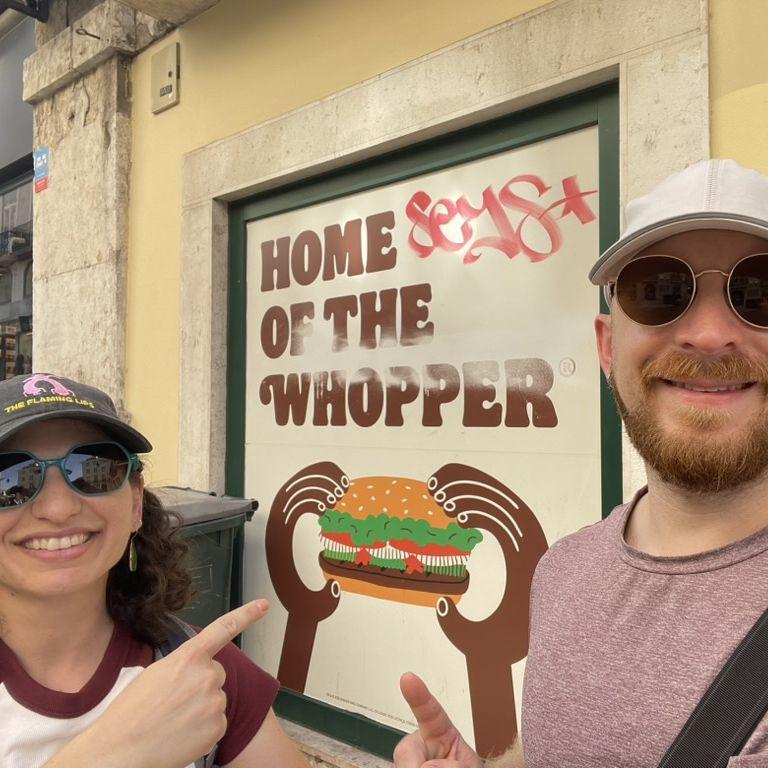The Whoppers in Lisbon, Portugal!

Explanation: Elliott's blues band/stage name "Shreddie King" and Julia's last name "Berger" makes our "celebrity last name" Berger-King... aka "The Whoppers"