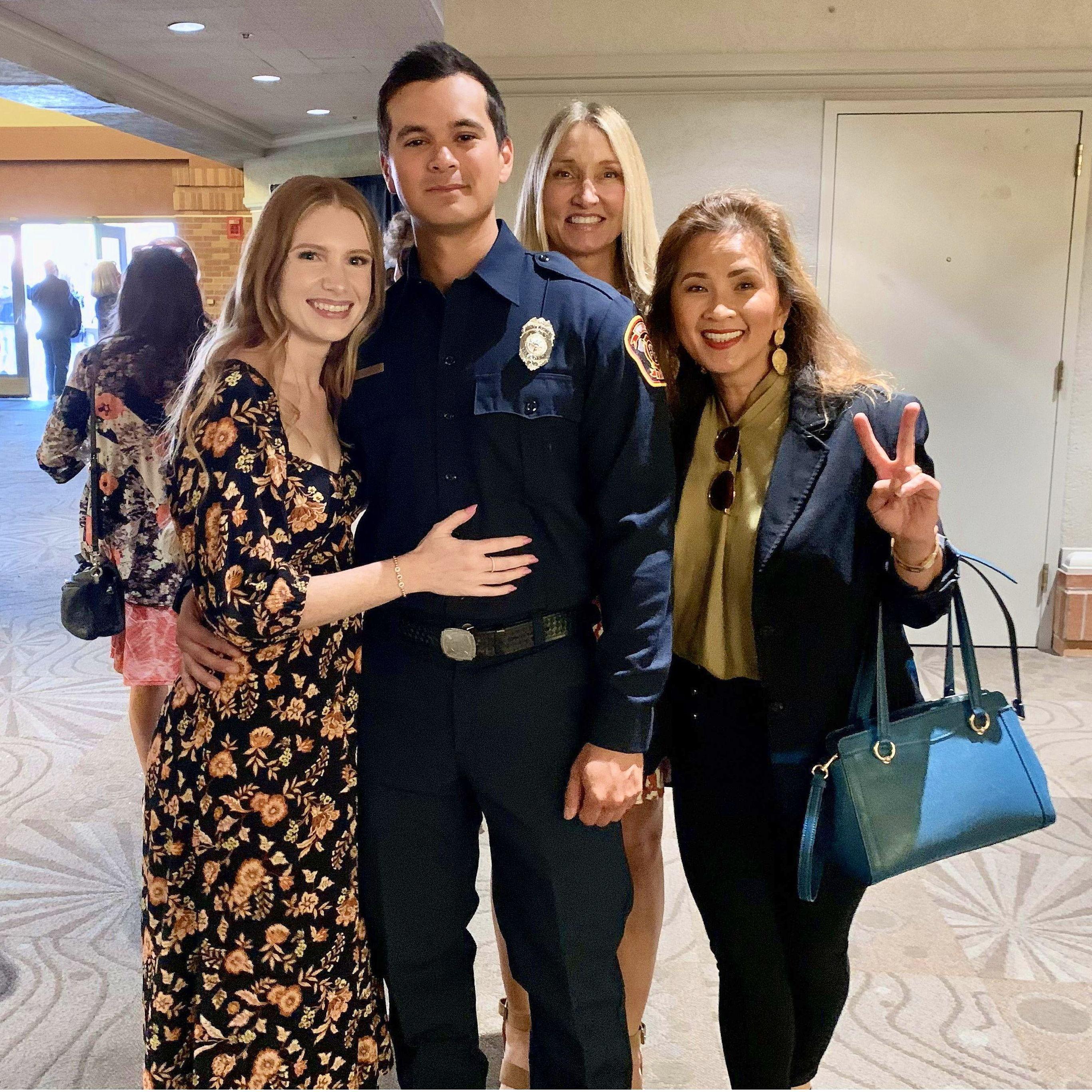 June 2022 | Kurt's badge pinning ceremony. From left to right: Erin, Kurt, Stephanie (Erin's mom), and Dinna (Kurt's mom).