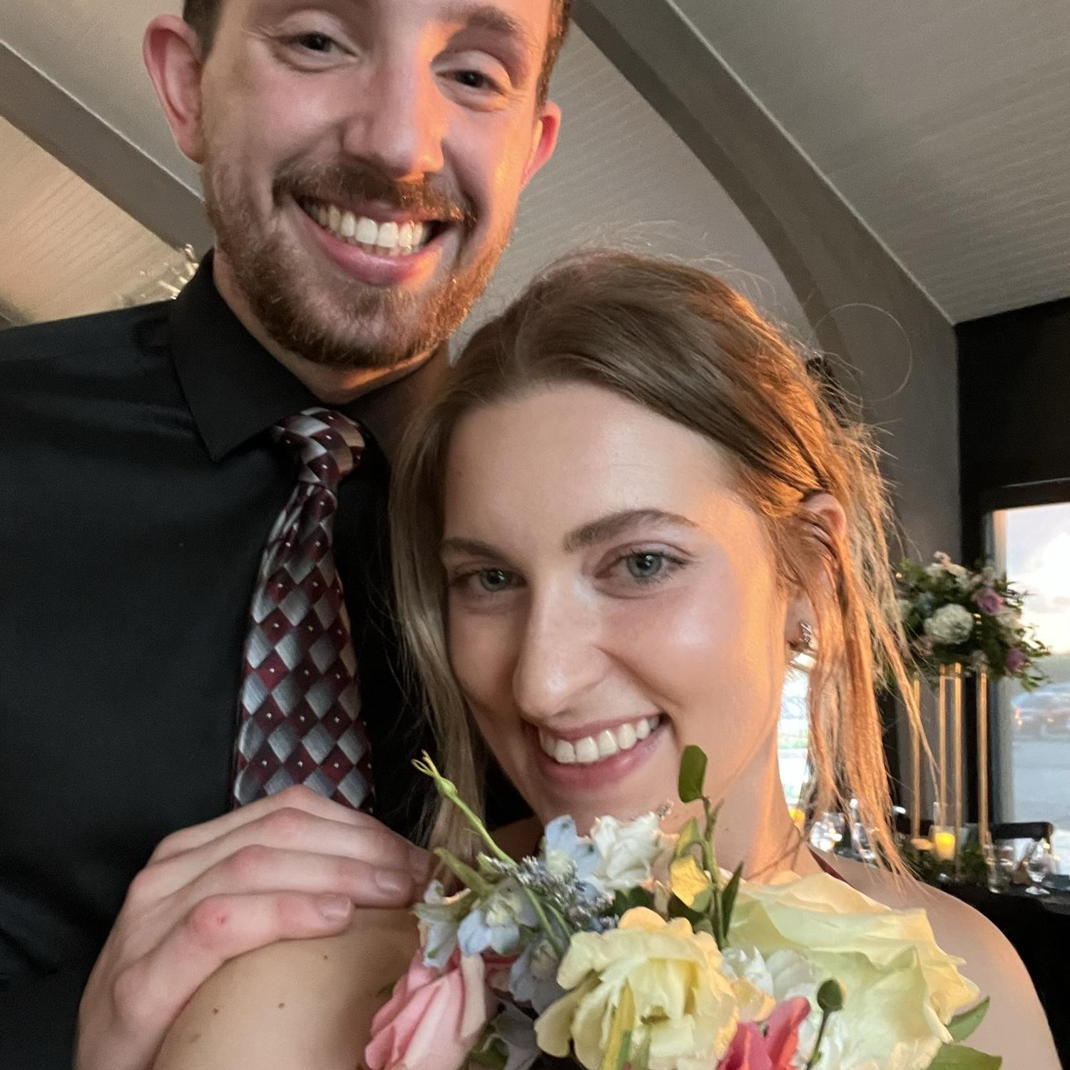 She caught the bride's bouquet!