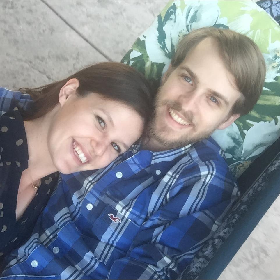 Relaxing in a hammock enjoying the summer breeze.
