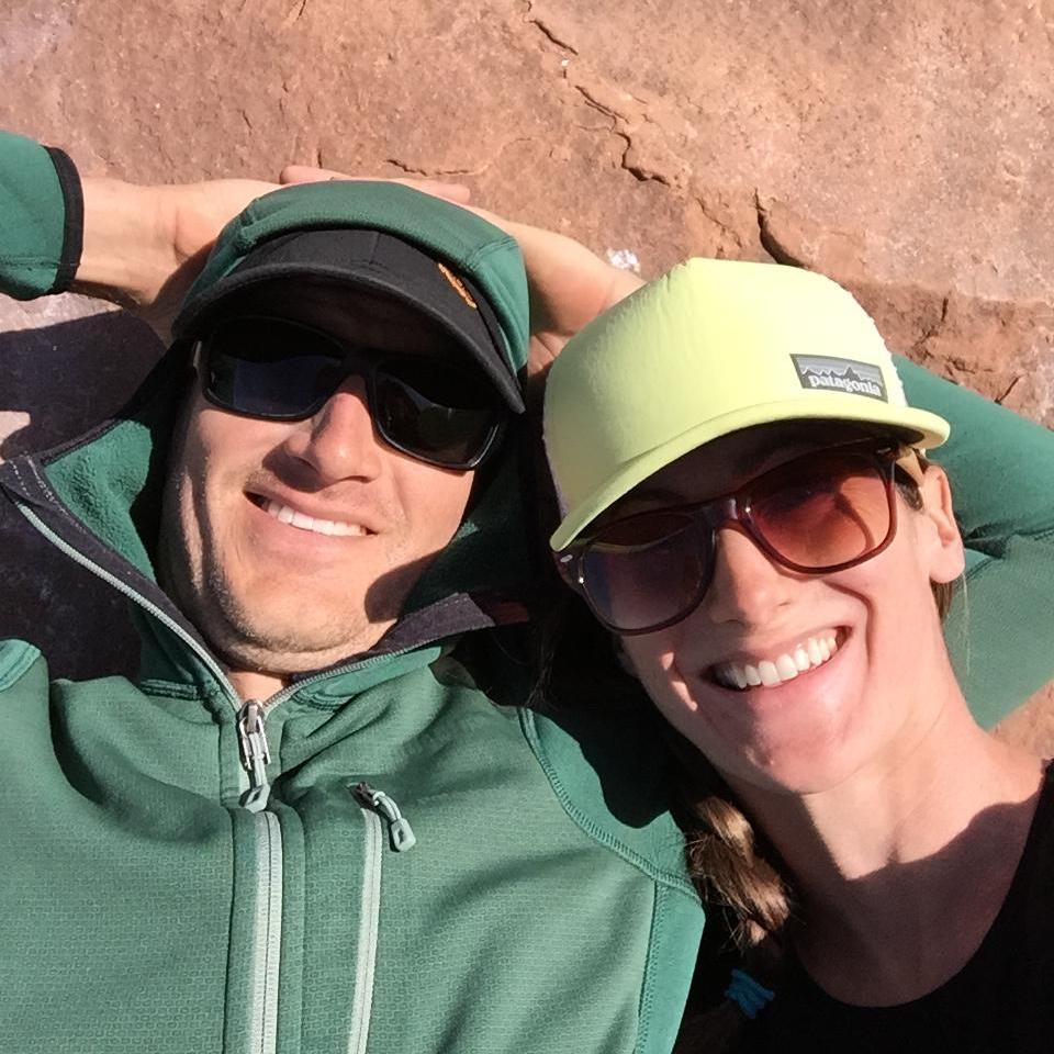 Doing our best lizard impression after getting shut down by the wind on Castleton Tower