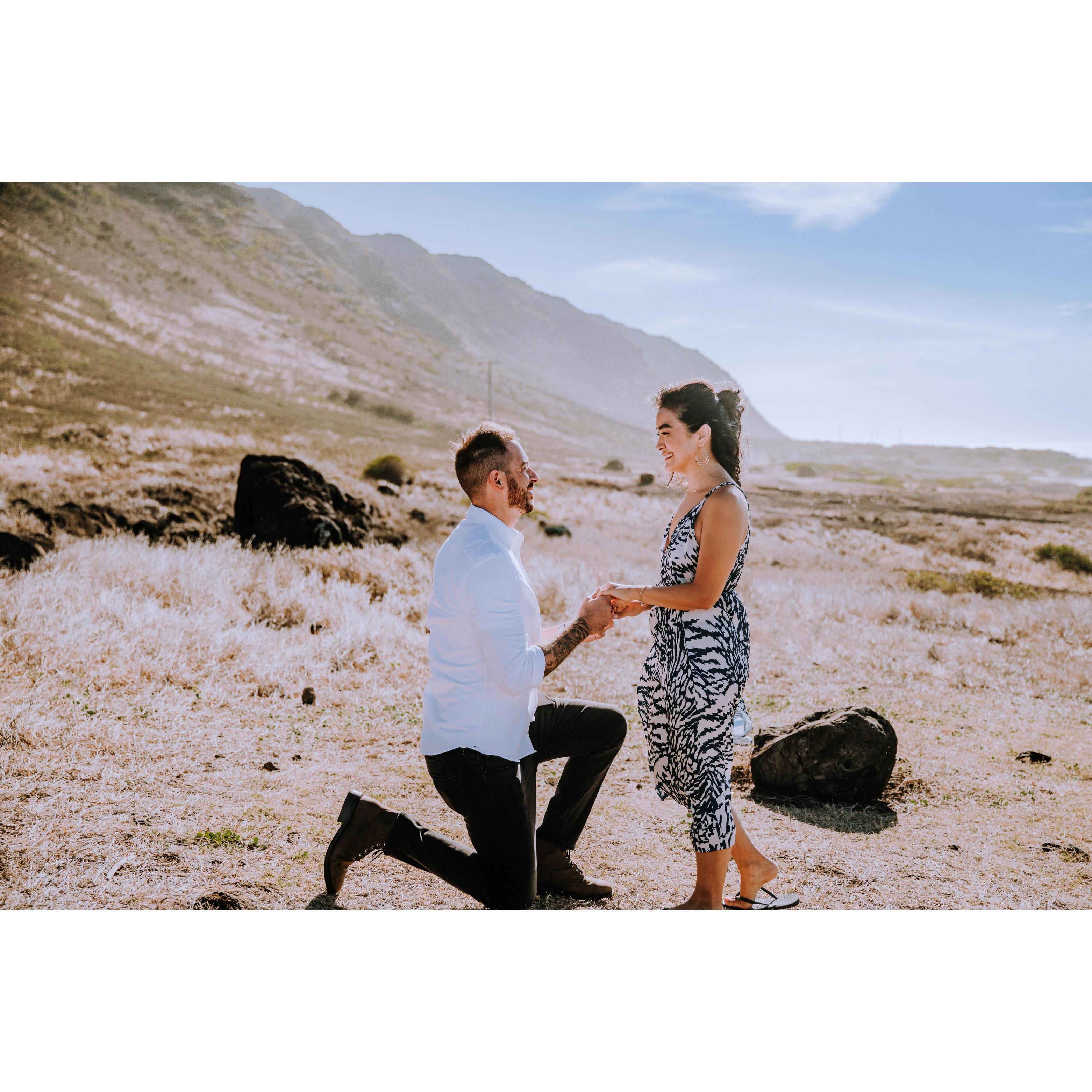 He proposed in Hawaii, sneaky guy! Also, this is the "posed" proposal photo. Scroll down for the real ones and just look at the difference, HA!