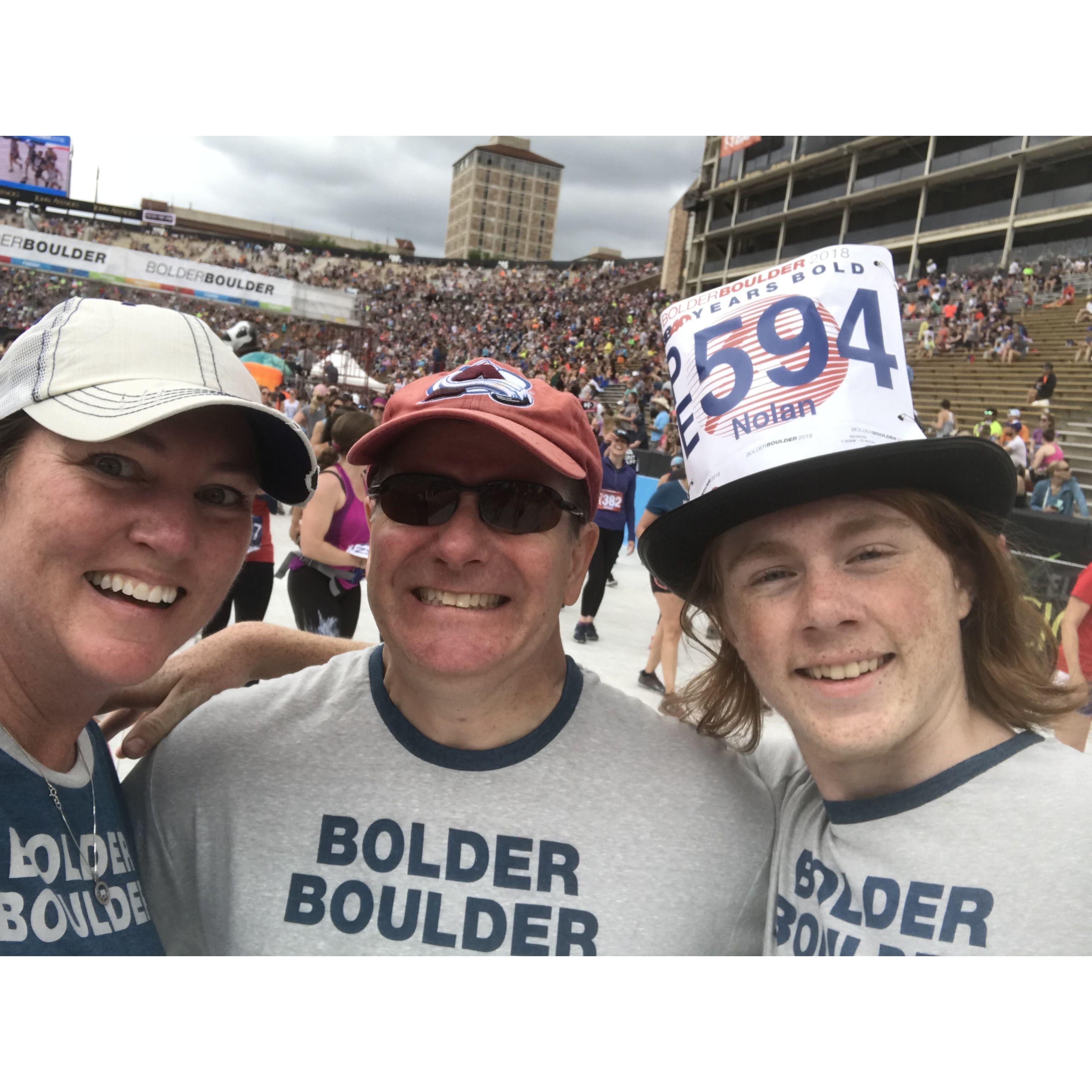 Running the Bolder Boulder with Nolan in his top hat.