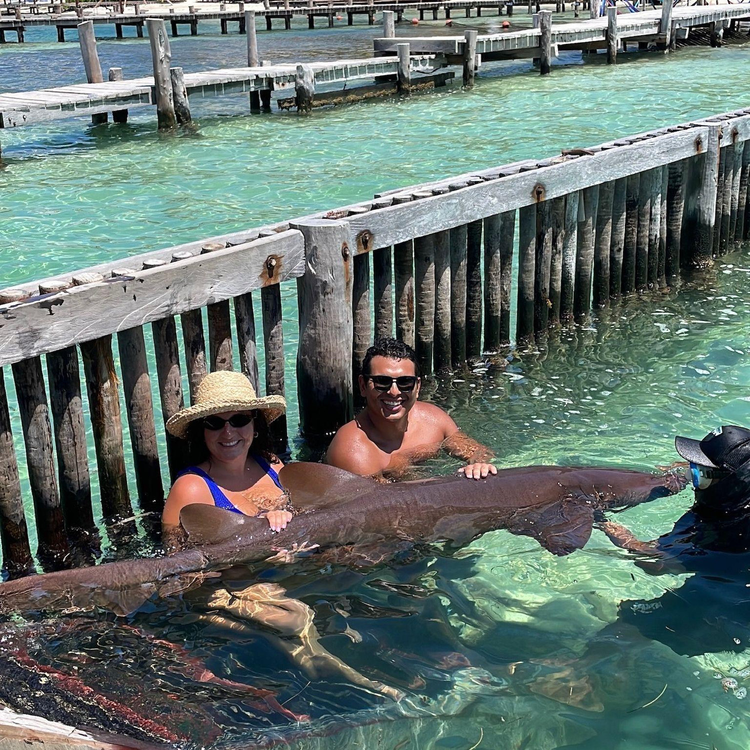 Enjoying Cancun as fiances! Parker shared a kiss with this shark shortly after