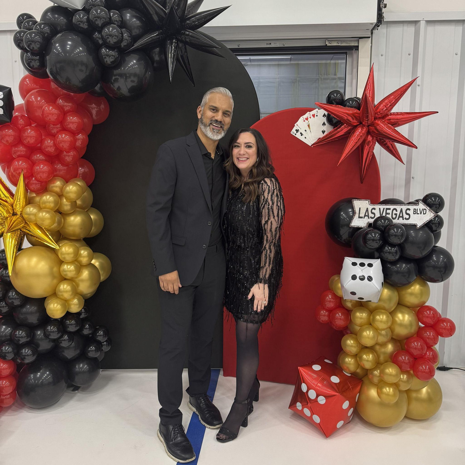 Dressed up and celebrating the holidays together at a Chevron Holiday Party.