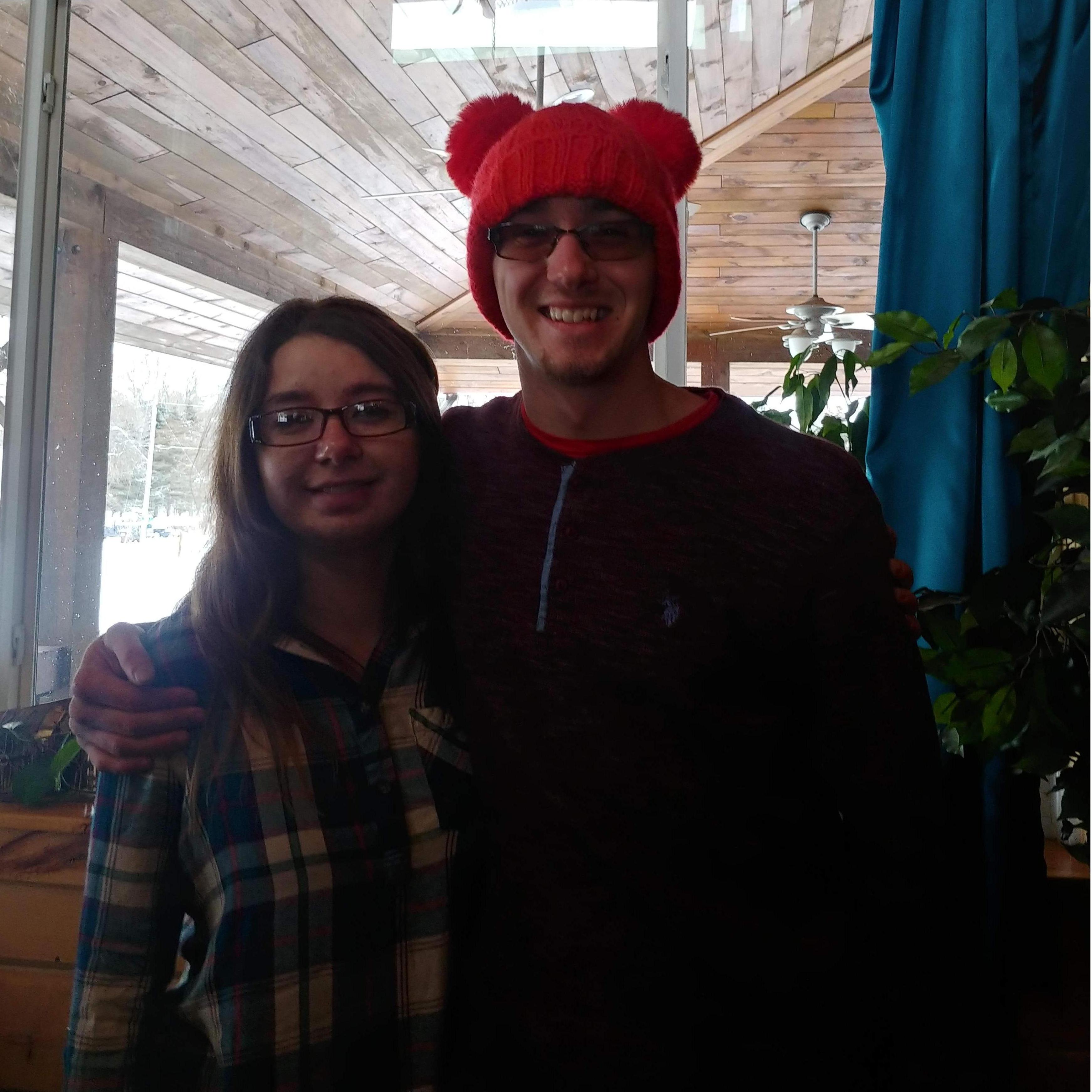 Levi trying on his sisters hat!