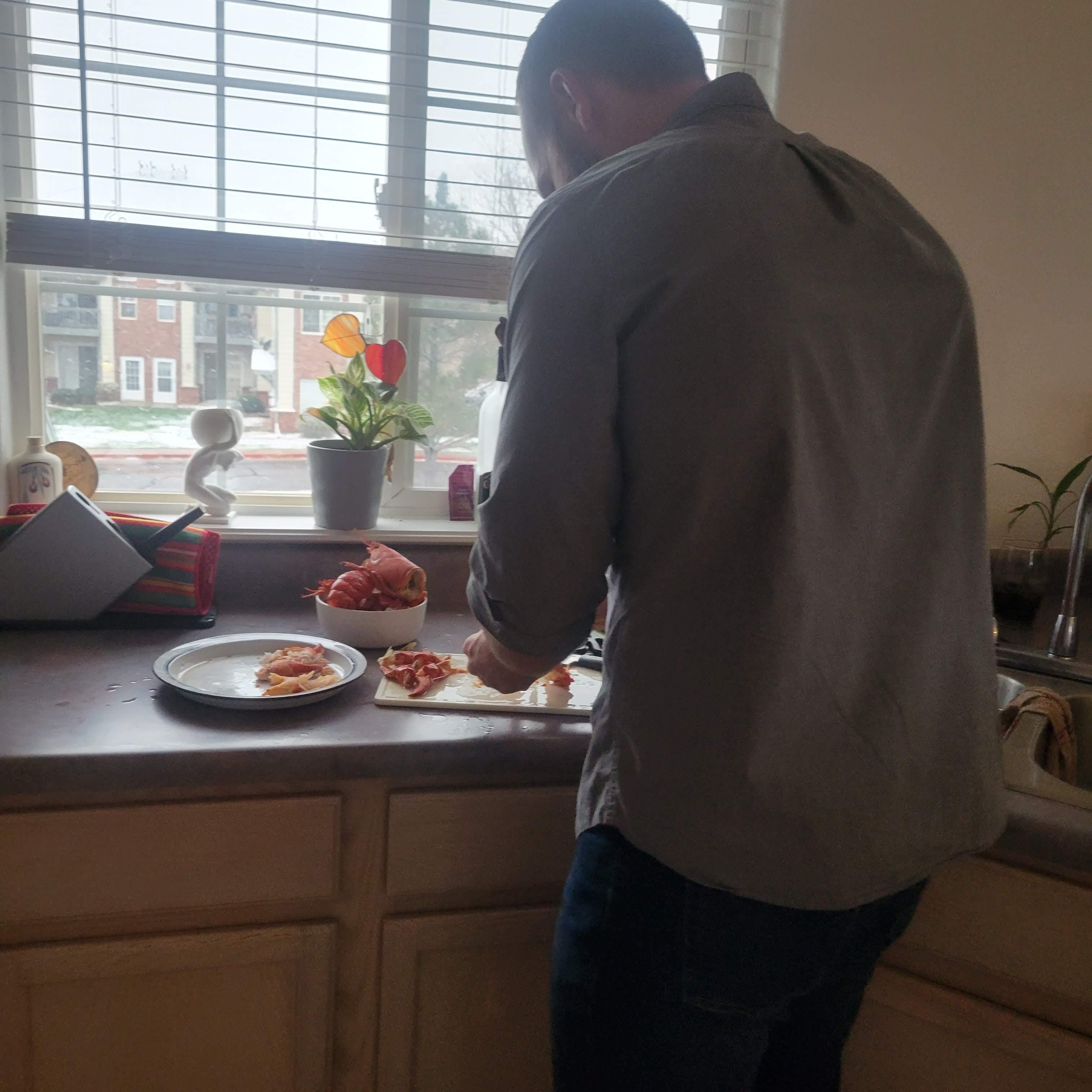 1st anniversary Zane helping prep the lobster