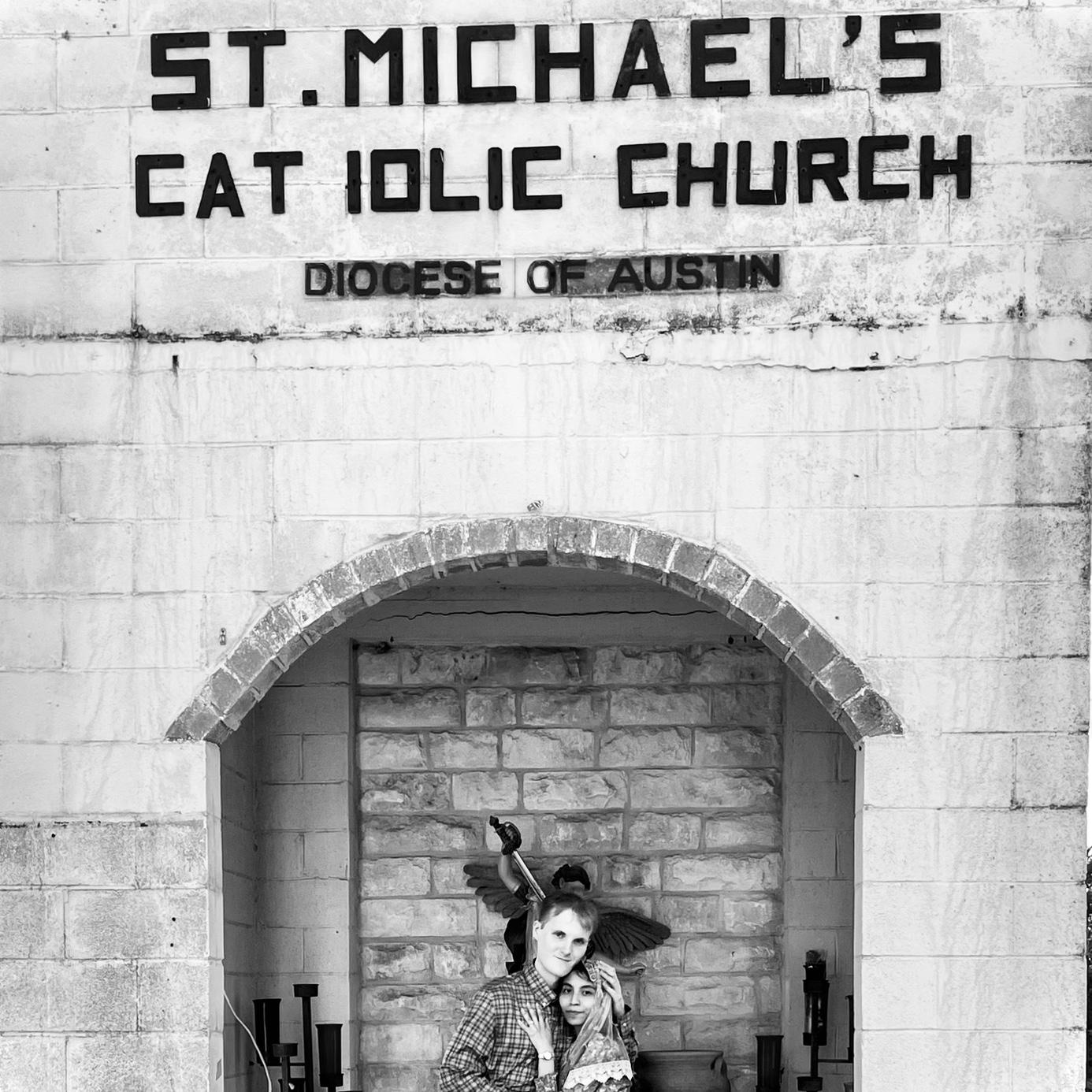 Joseph proposed under the old bell tower of Saint Michael Catholic Church, Uhland, TX.