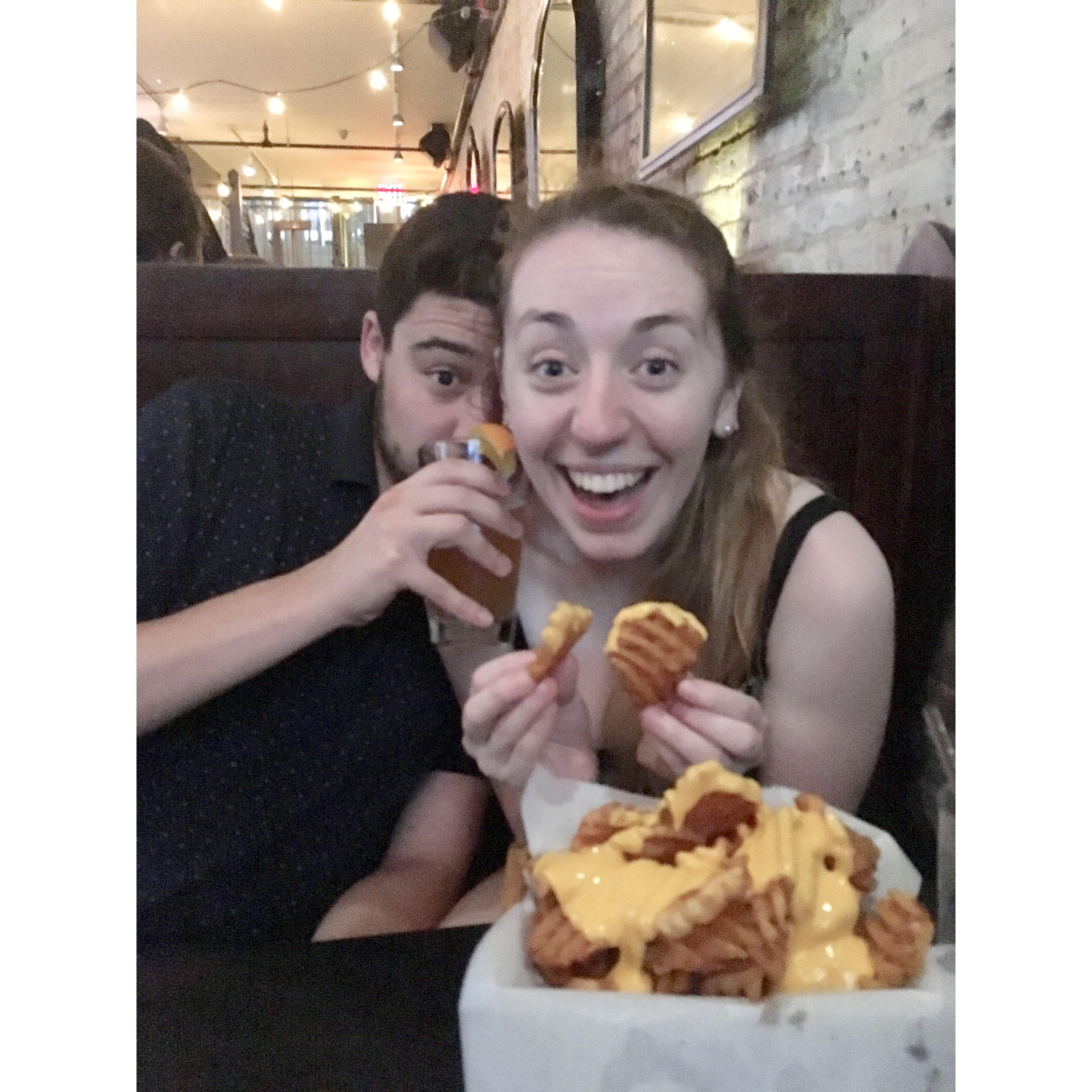 Lots of things Emma loves in this photo (cheese fries)