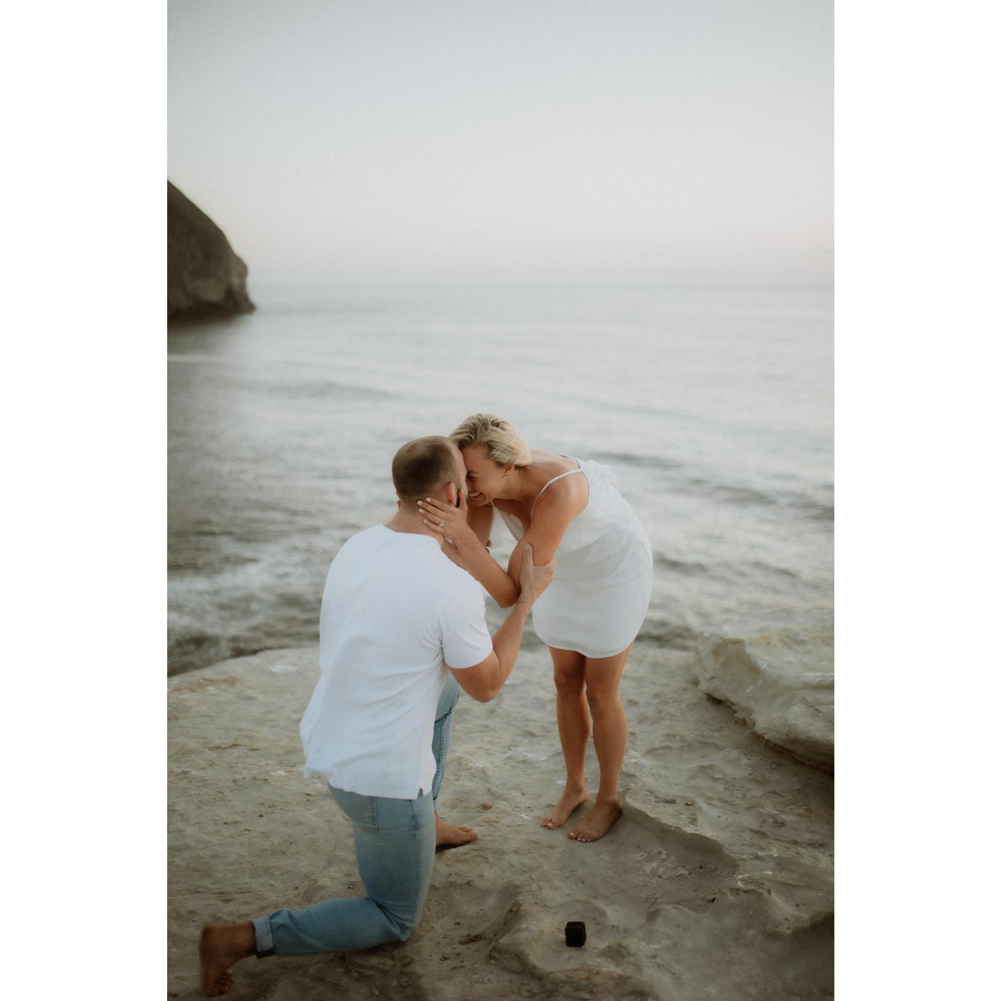 The proposal in Pacific City, OR on our drive home for a week long West Coast Road trip.