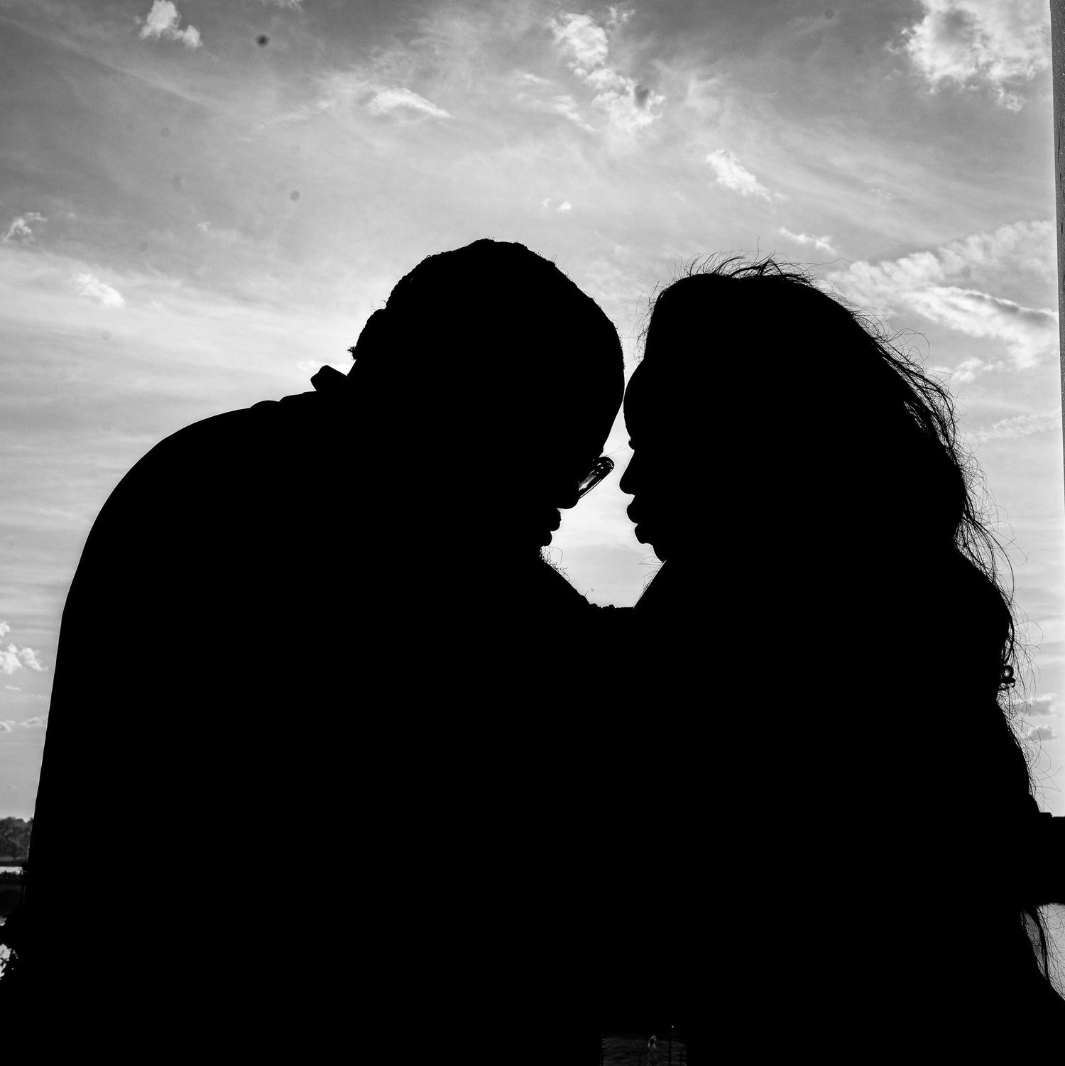 An intimate moment between us, standing close beneath the open sky. This photo reflects the quiet, deep connection we share and the love that brought us here.