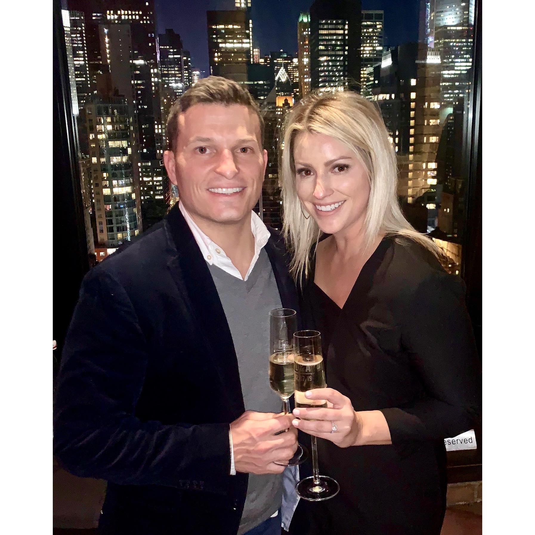 Our engagement party on top of NYC