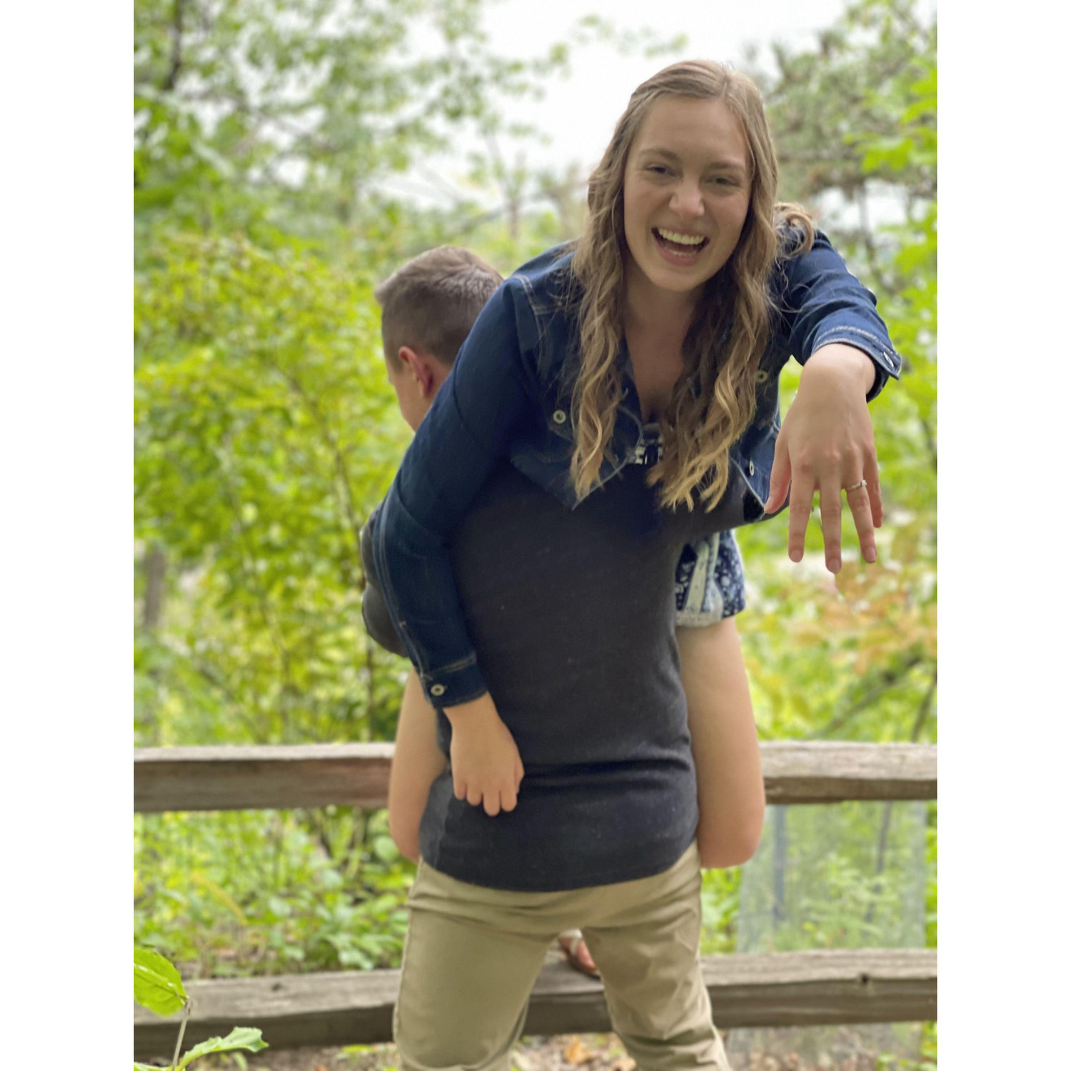 TJ is definately strong enough to lift me without help from the railing...