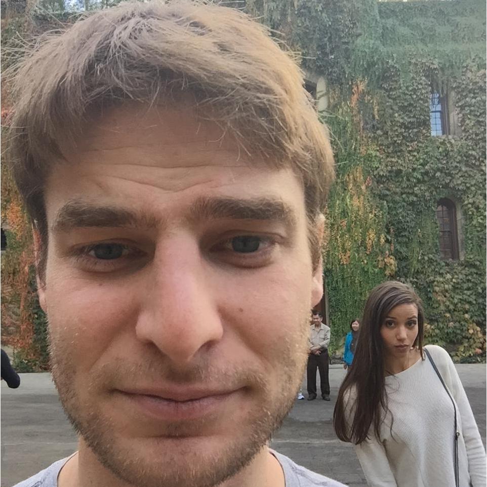 Connor with his best attempt at a selfie in Napa, with someone creeping in the background