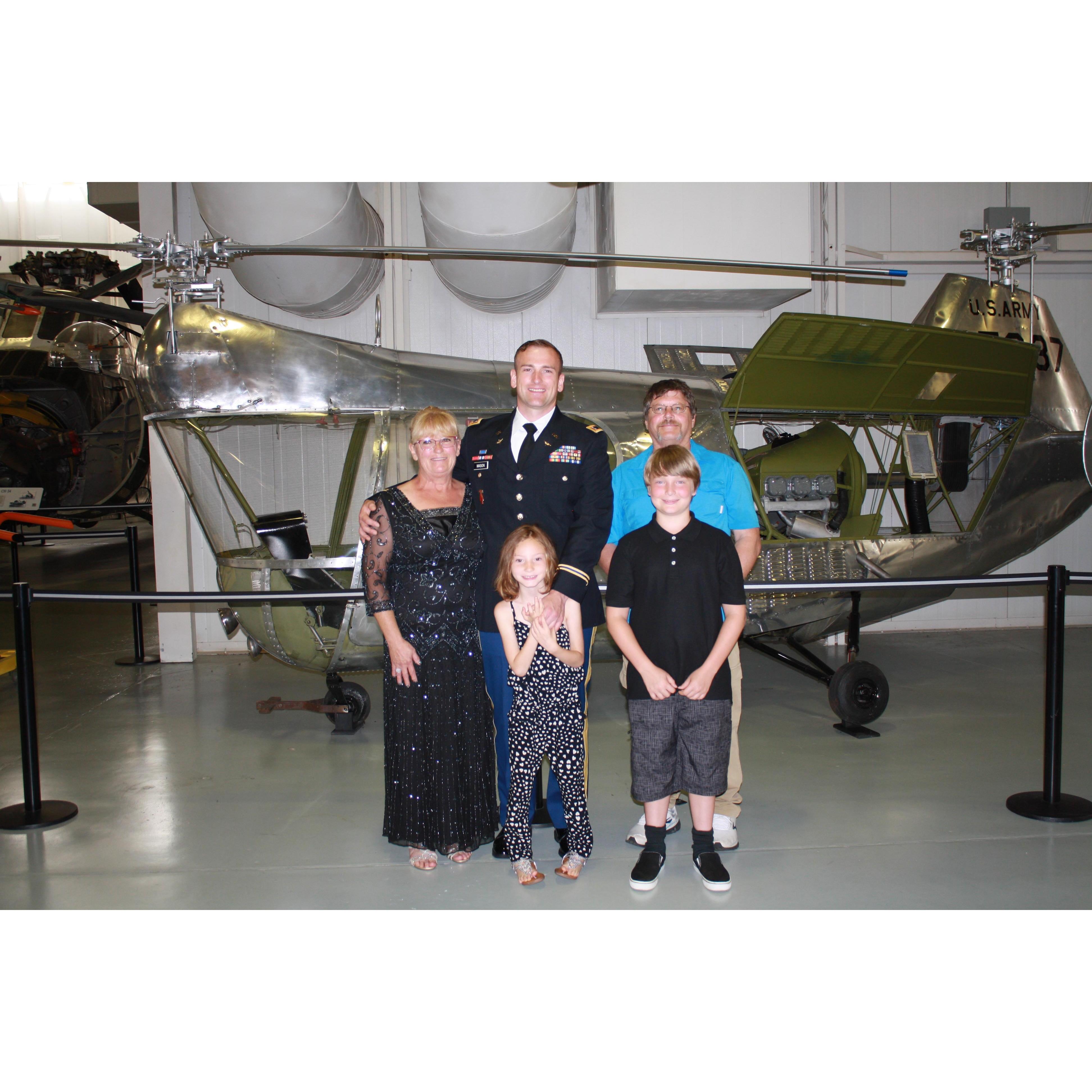 Henry, Theo, Kaida, Charlie (his mother) and Scott (his stepfather) at his graduation from flight school.