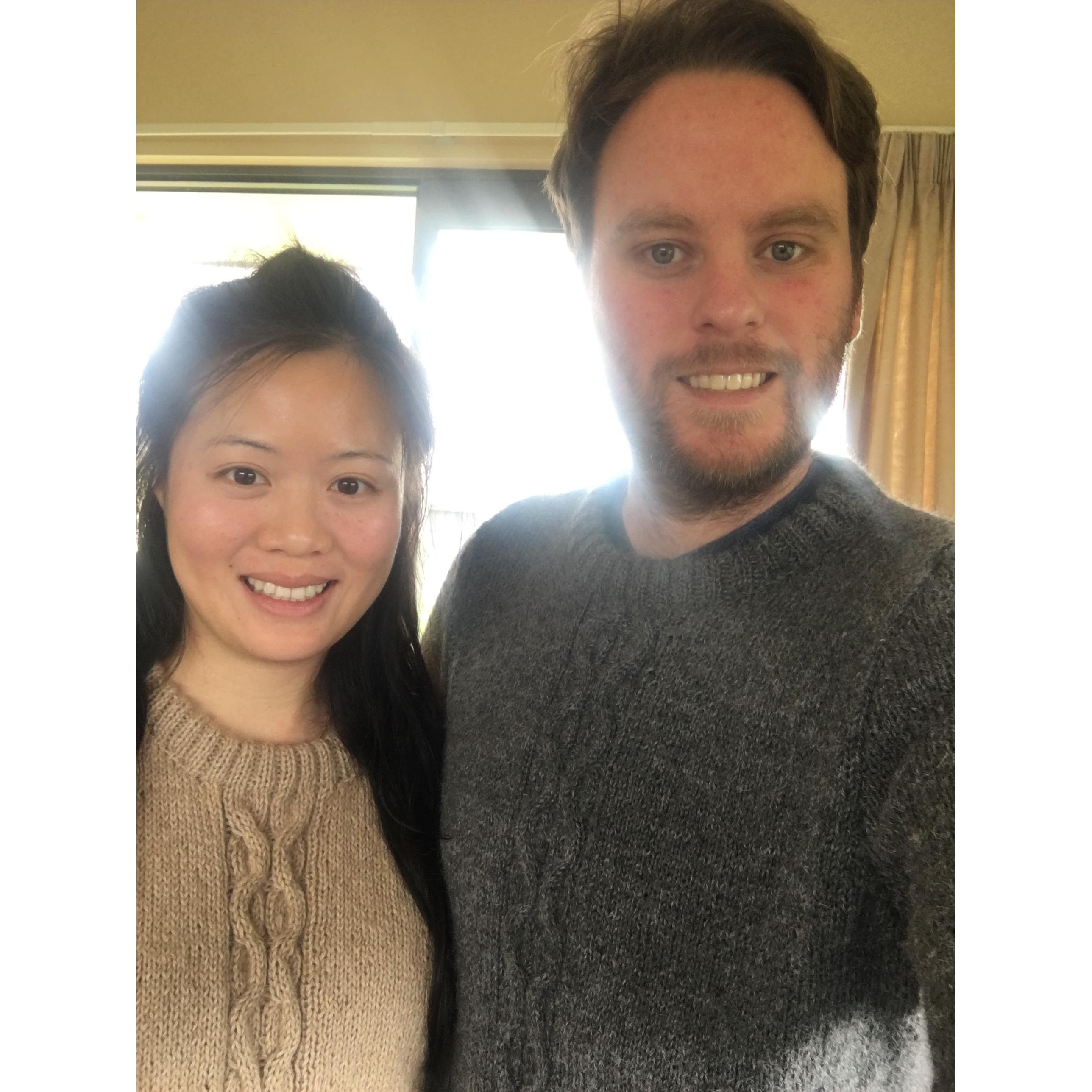Wearing our matching alpaca sweaters bought on a rural farm in New Zealand.