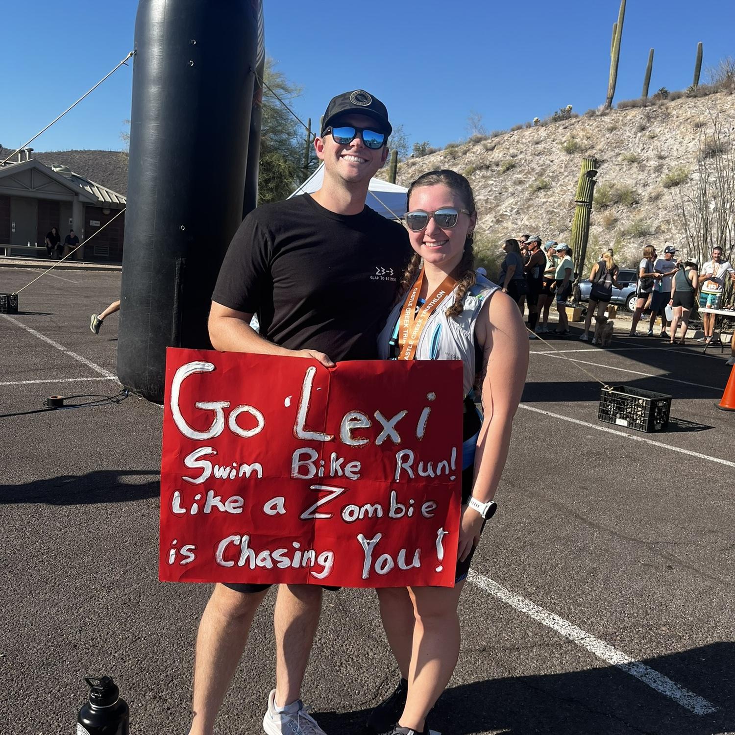 Daniel supporting Lexi at one of her triathlons