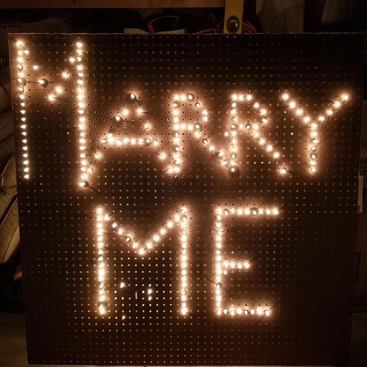 Jeremy's hand made sign he made to ask me to marry him Christmas Eve after the family fireworks!