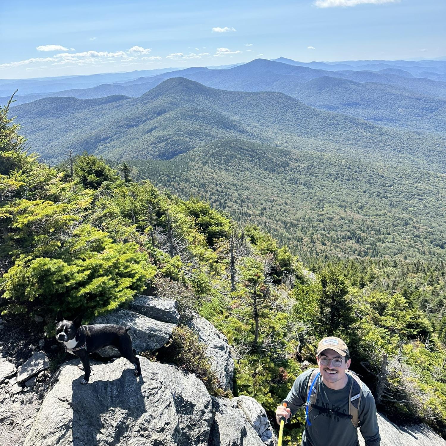 Nathan n Moo climbing Mt. Mansfield
