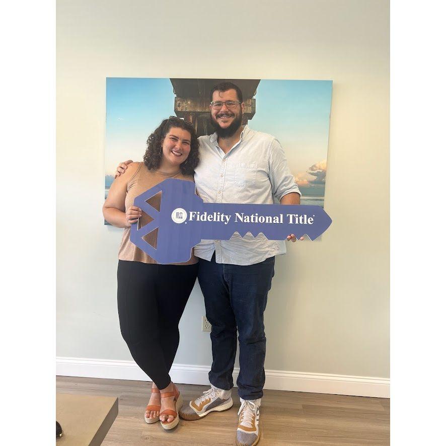 After signing papers to close on our first house, July 2023