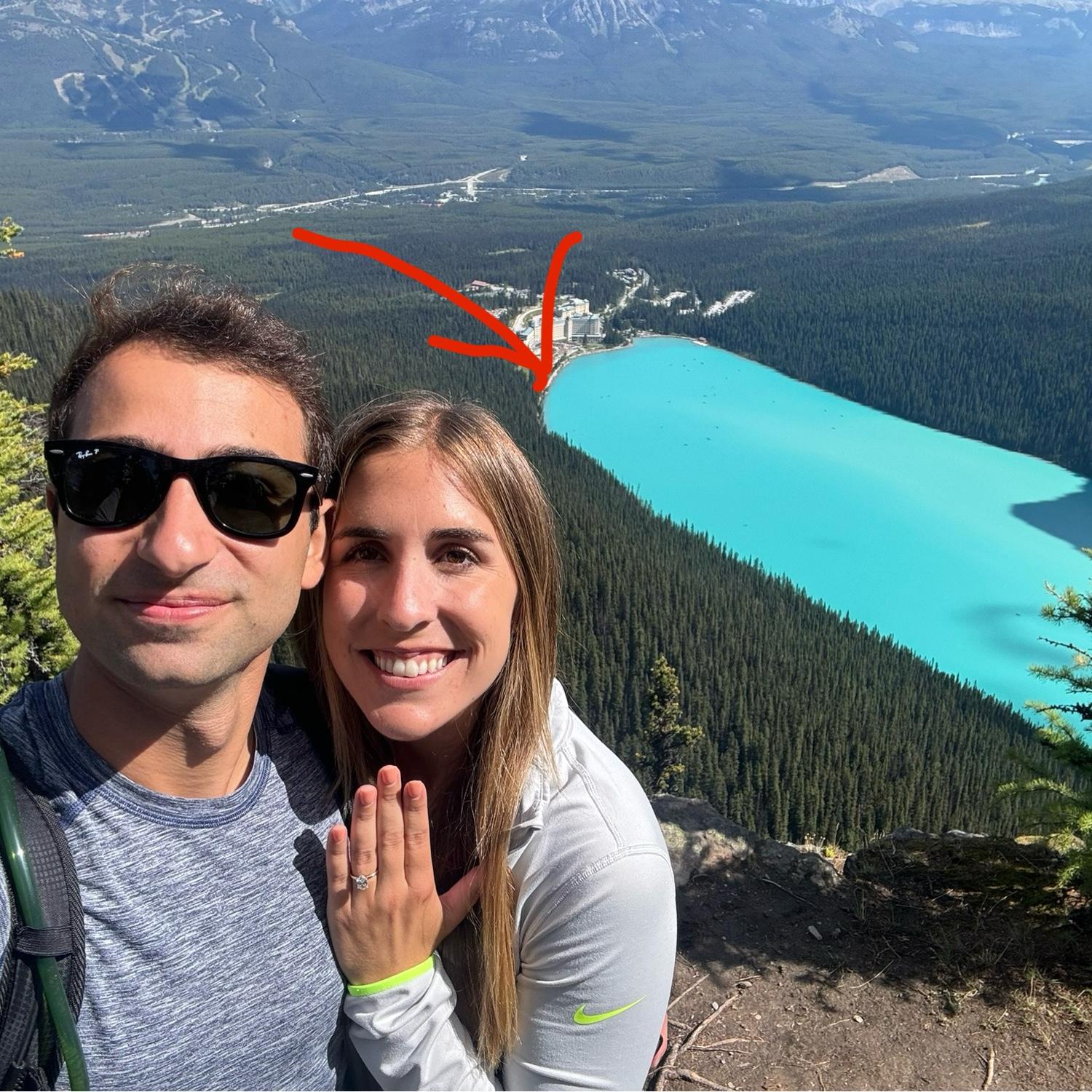 Posing in front of Lake Louise where we got engaged from the top of the mountain.