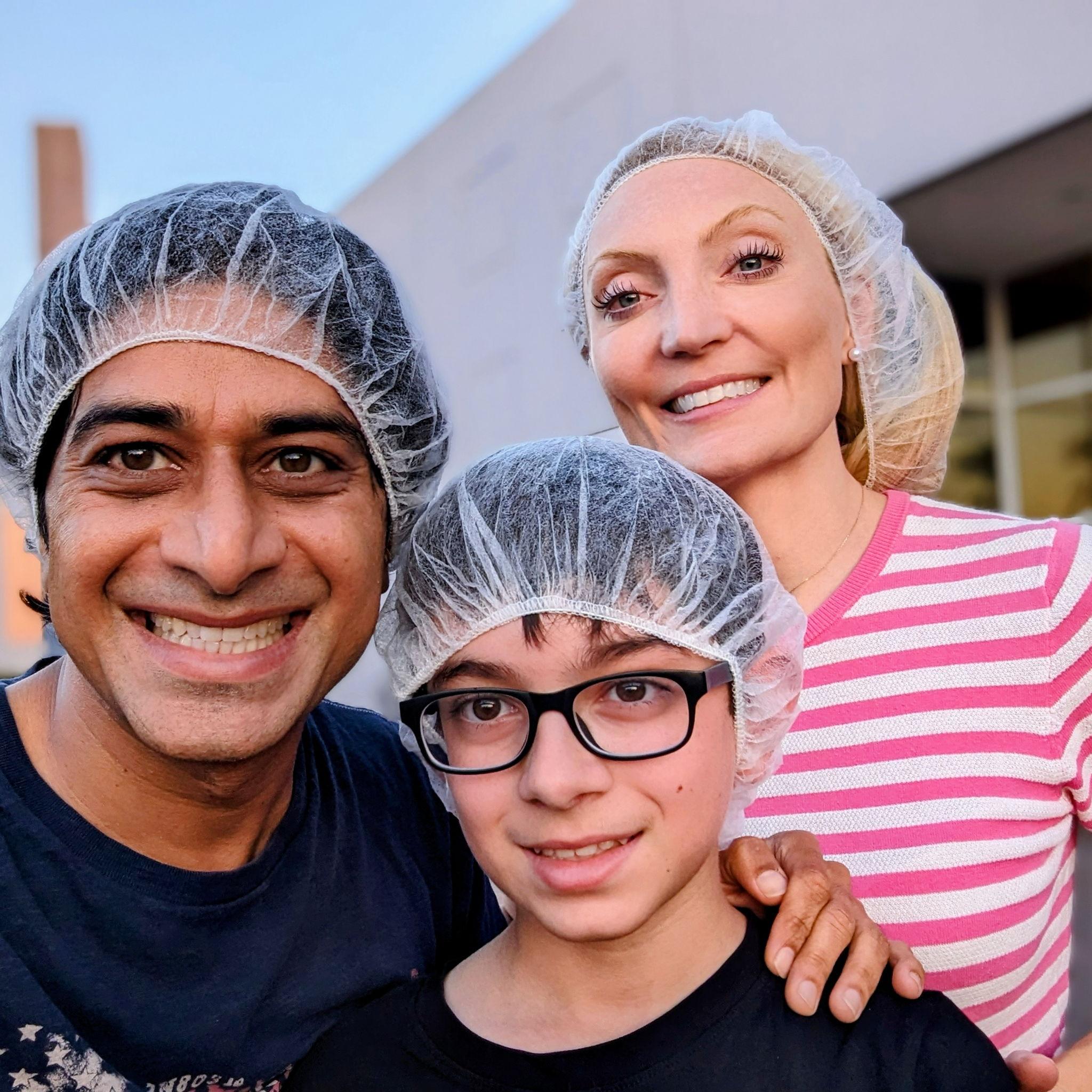 Don't we look lovely in hair nets??  Volunteering at FeedMyStarvingChildren
