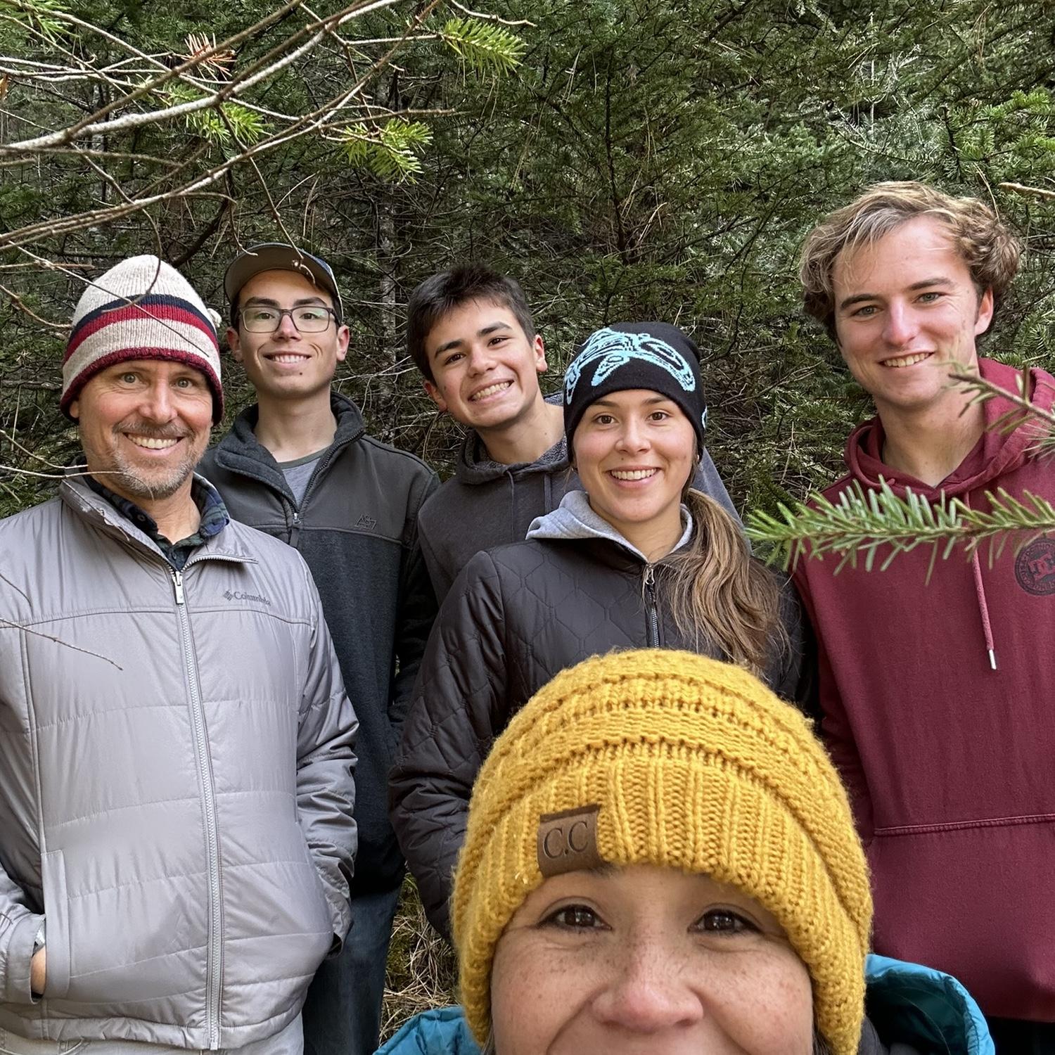 Another Thanksgiving photo, taken on the Heerema's annual day-after-Thanksgiving Christmas tree hunt. Can you spot the lucky tree in the background?? 🌲