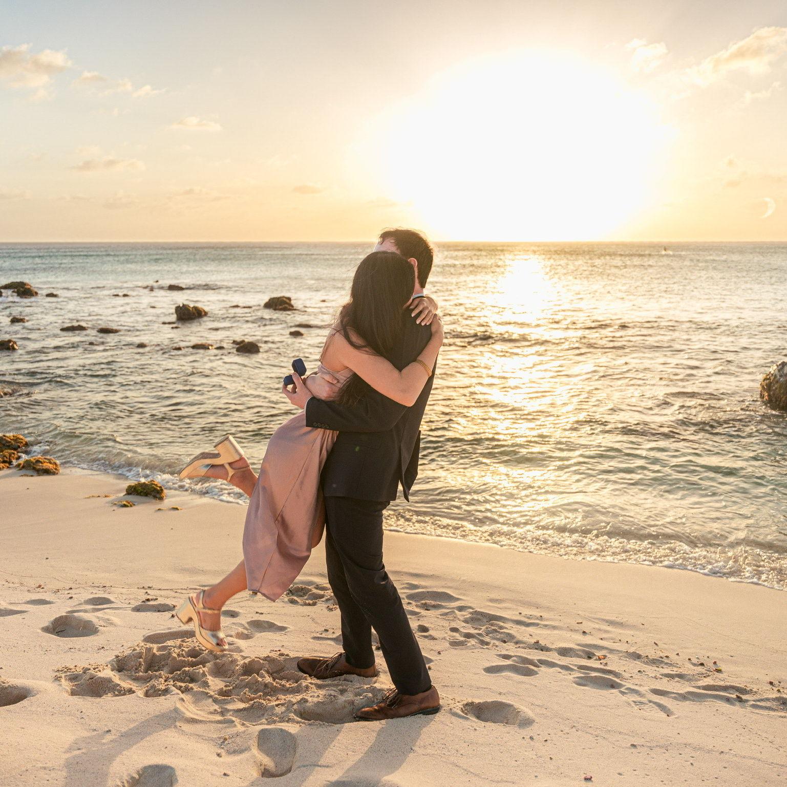 The photographer was posing us and then had us stand back to back. Then he instructed us to turn around. When Lauren turned around Evan was proposing and it was the most beautiful and exciting moment!