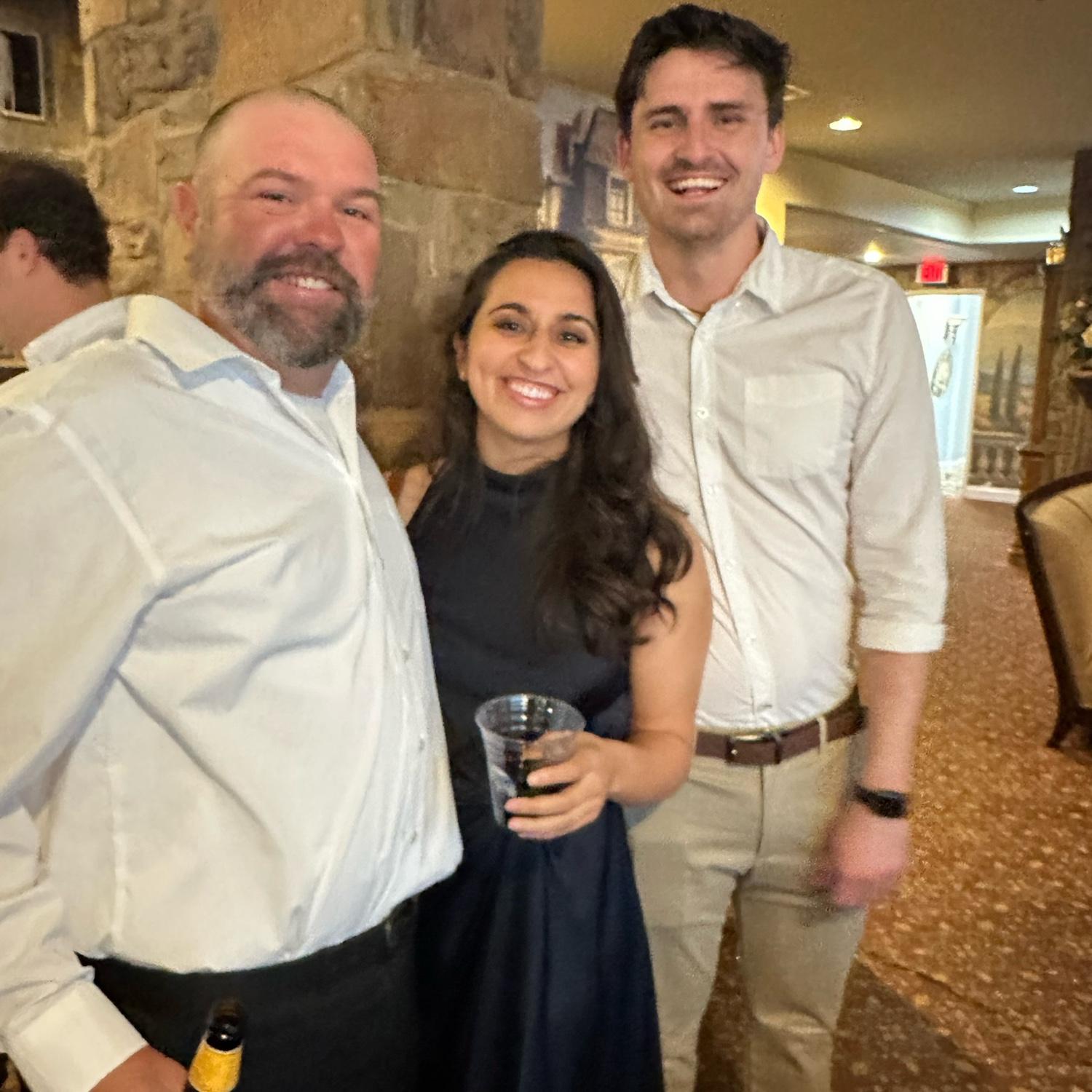 Us and our officiant. He's known us since we were both 13!