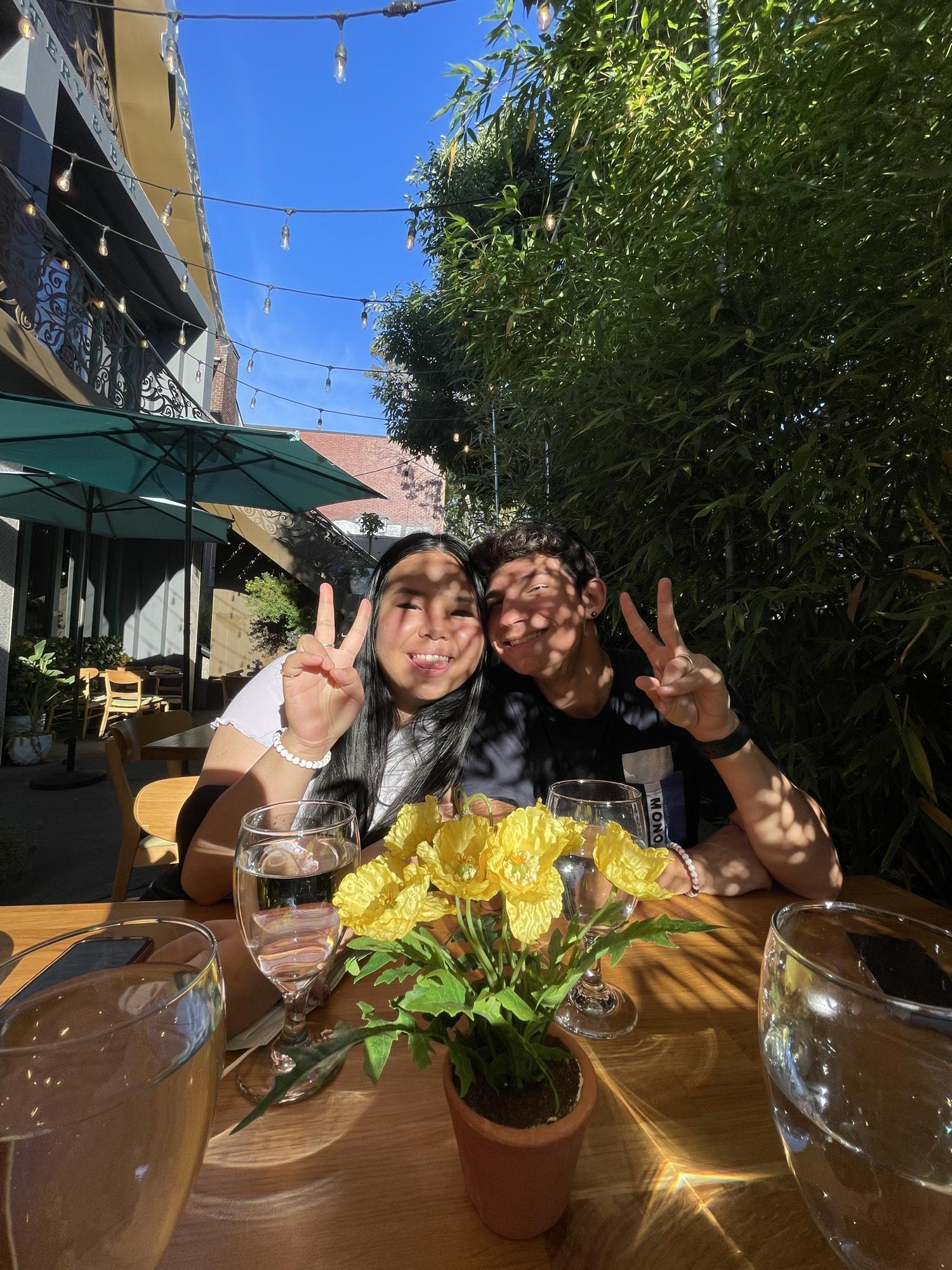 One of my favorite photos of us, doing what we love most - eating at our favorite Thai spot. (Sept 2021)