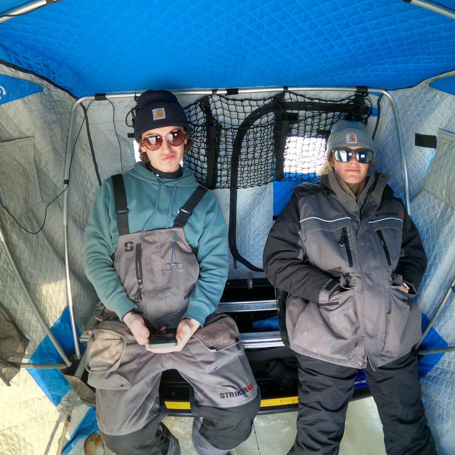 Trying to stay warm while ice fishing, and looking good while doing it