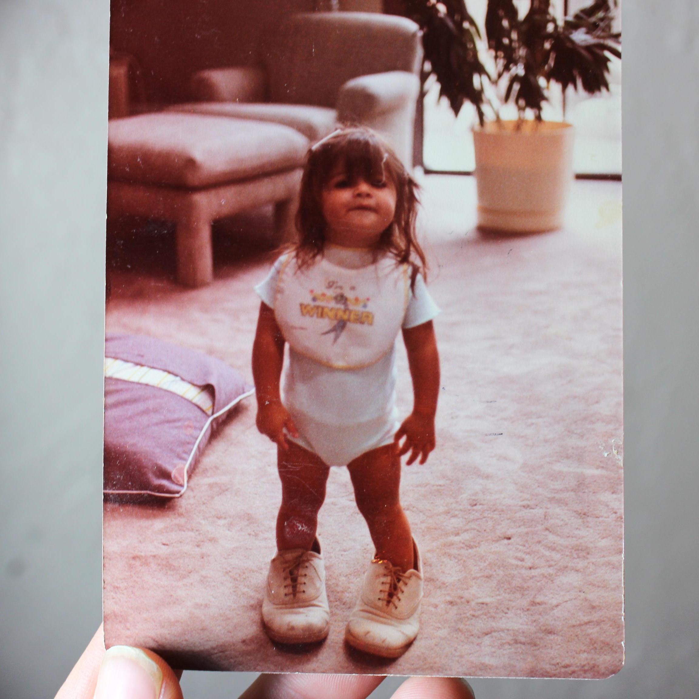 Baby Christin wearing her Daddy's shoes ;)