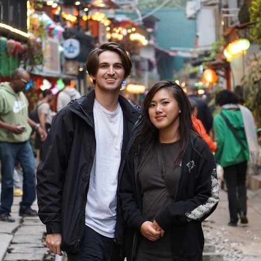 Hanoi's Train Street, where the restaurant/shop owners welcome you with shots of their house-made rice wine