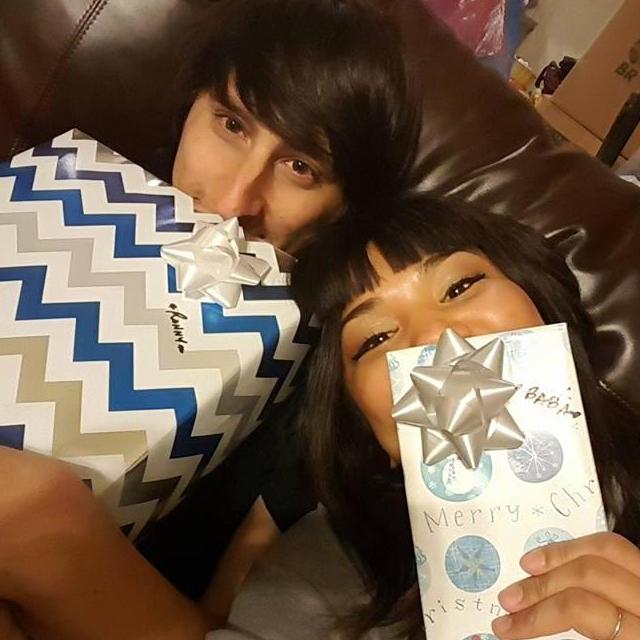 Opening Christmas gifts from Alahnna's parents in 2017.