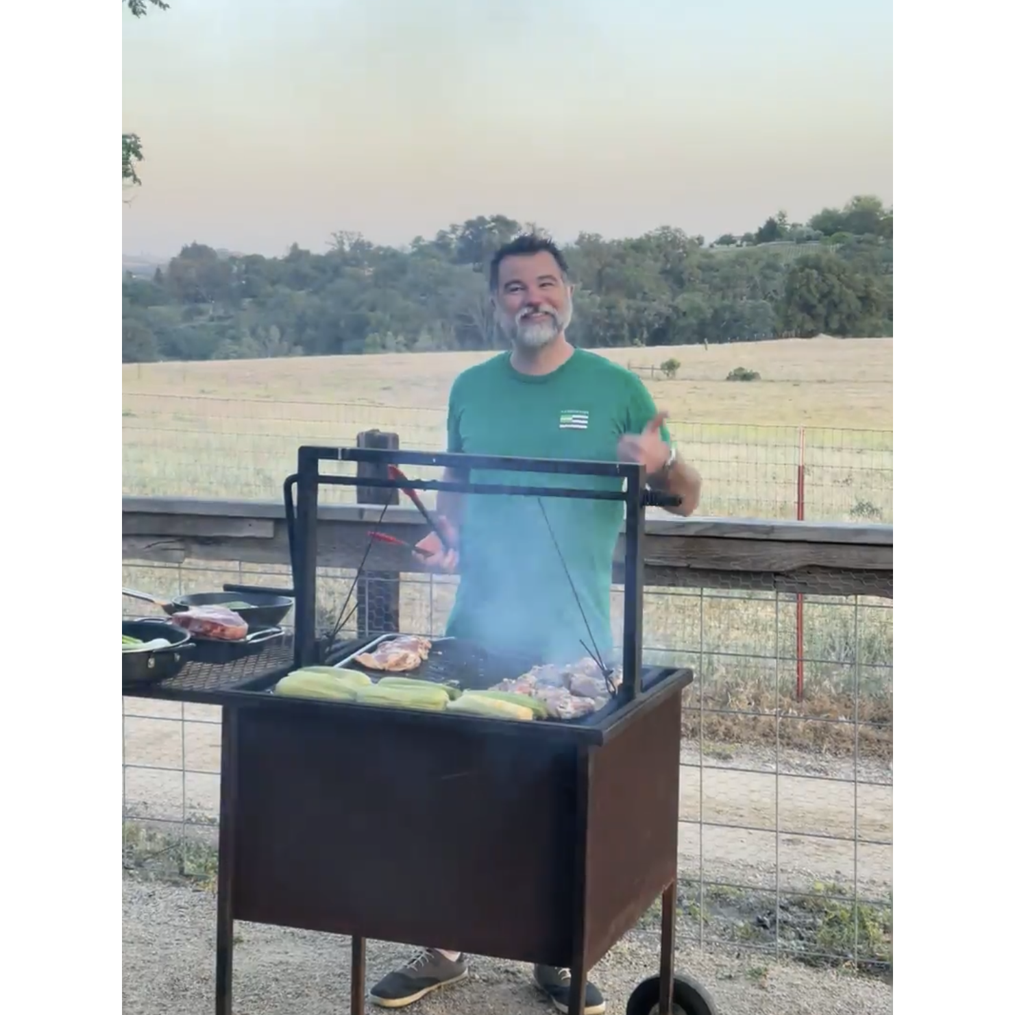 One of Kevin's joy around a grill. Look at that smile.